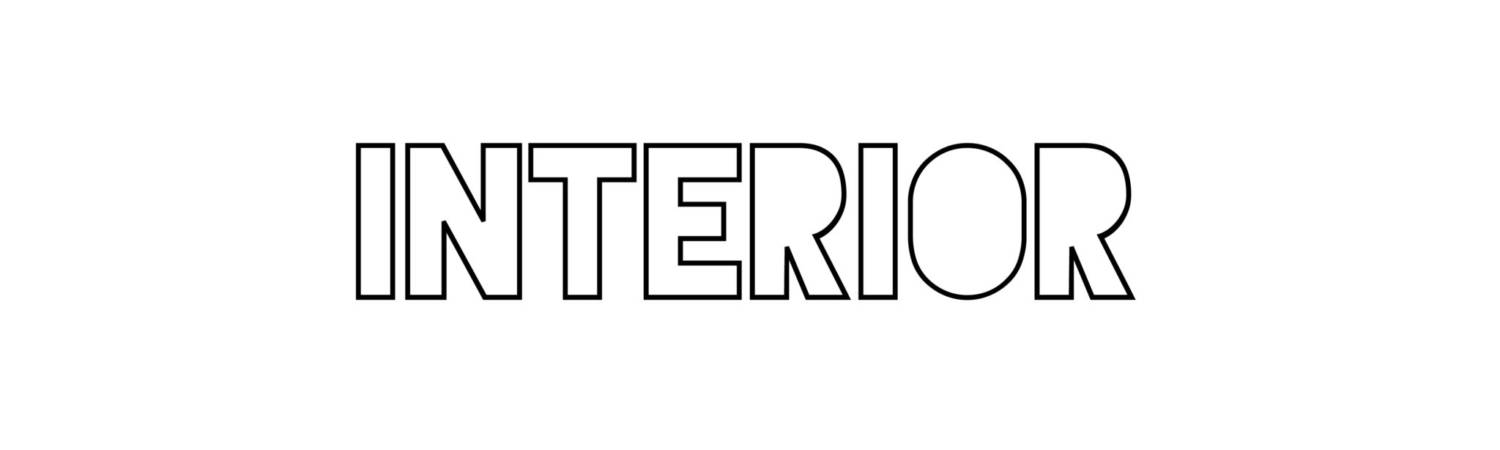 Schwarzer Text "INTERIOR" auf weißem Hintergrund in fettgedruckter, moderner Schriftart.