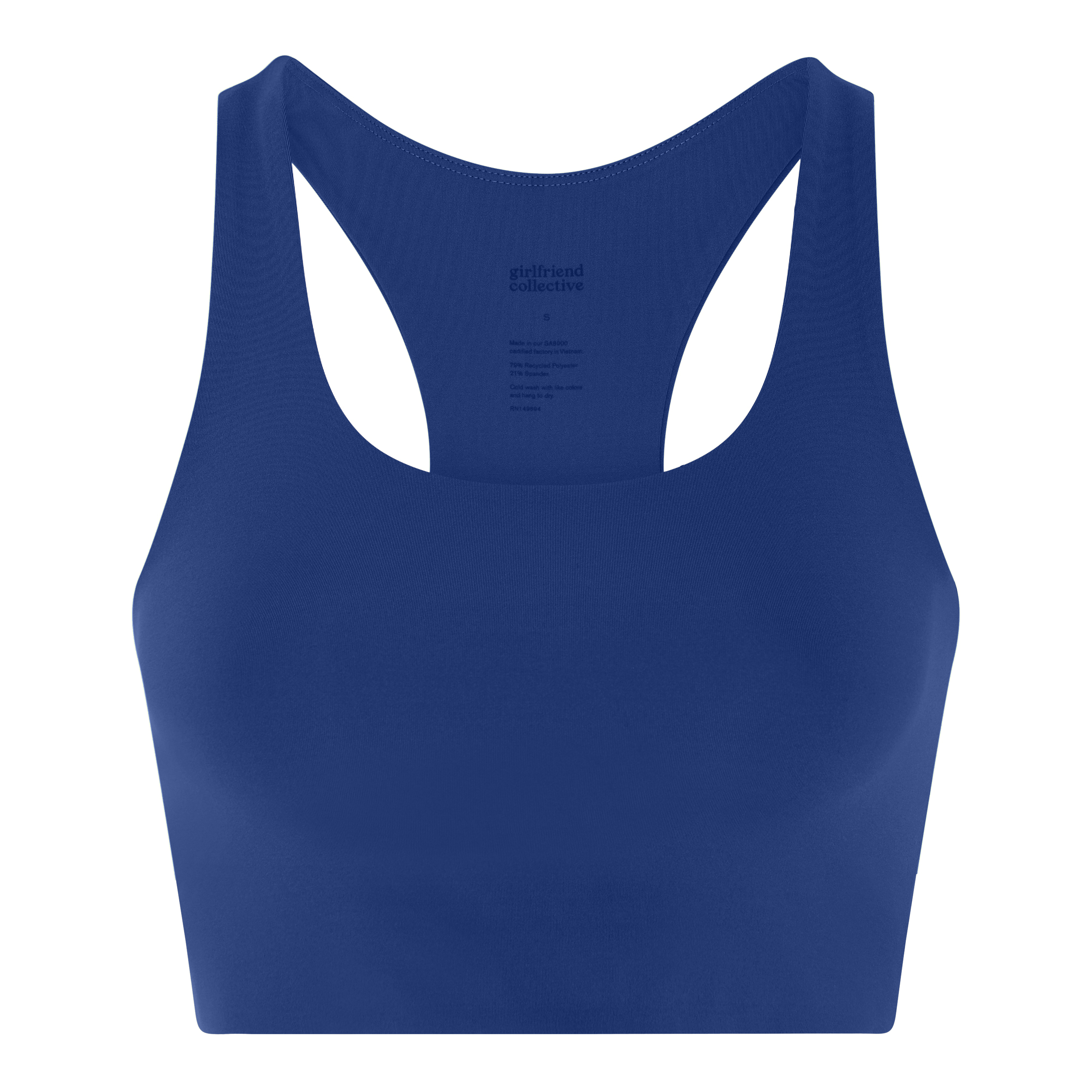 Ein schlichter, kobaltblauer Sport-BH mit Racerback-Design auf weißem Hintergrund. Die Vorderseite ist glatt und nahtlos, und das Stoffetikett ist auf der Innenseite des Rückens leicht sichtbar.