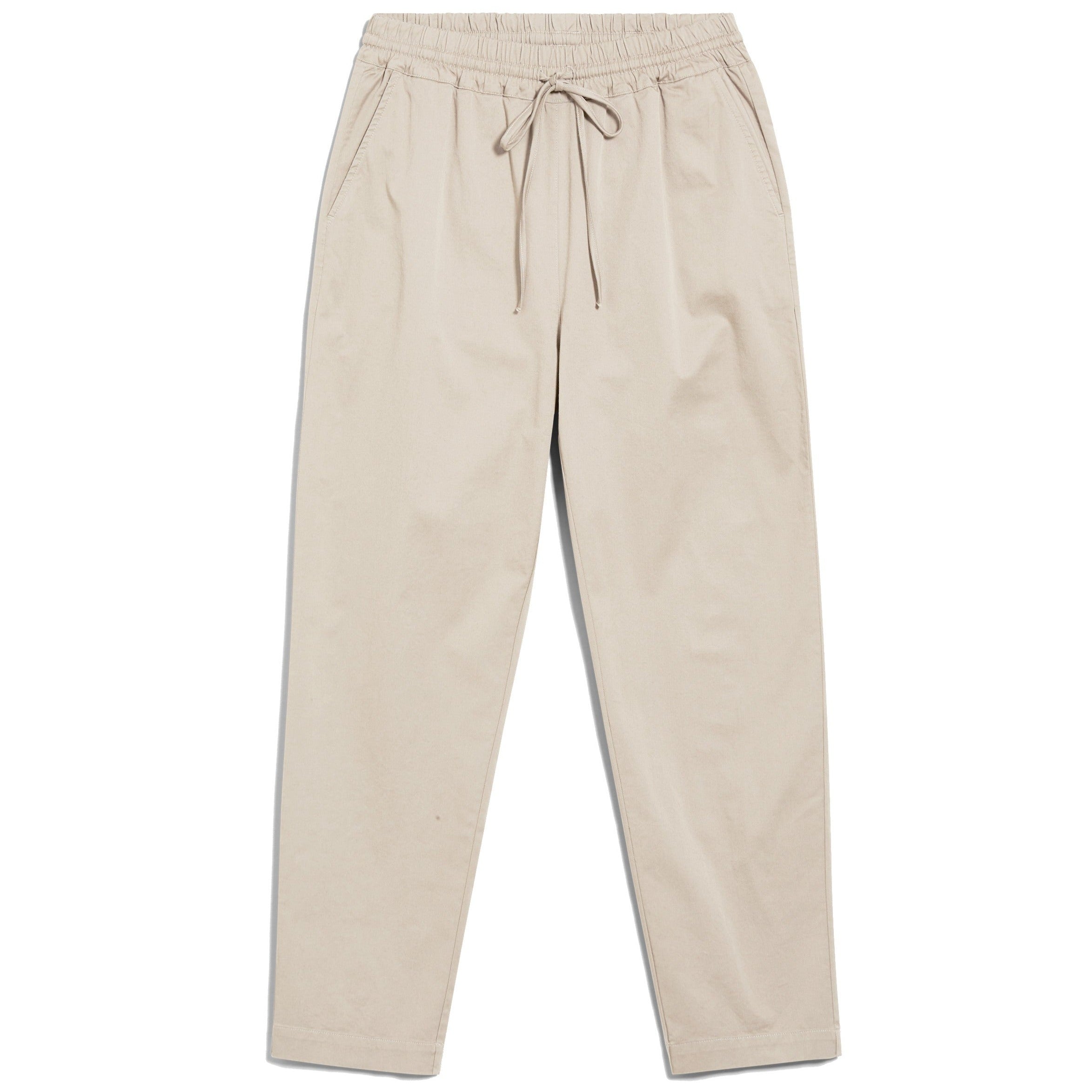 Beige Jogginghose mit elastischem Bund und Kordelzug, präsentiert auf weißem Hintergrund.