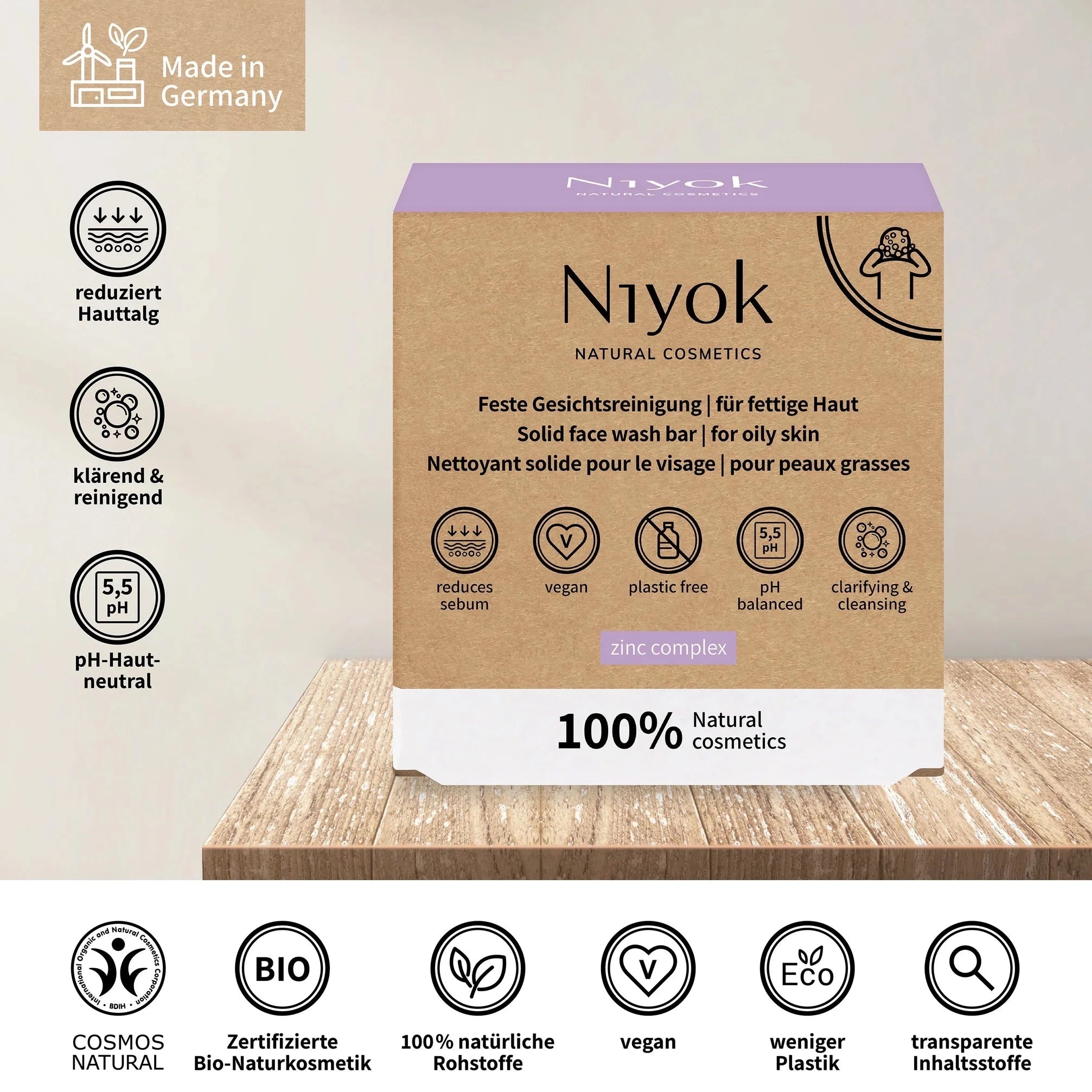 Verpackung eines festen Gesichtsreinigungsprodukts von Niyok, vegan und plastikfrei, für fettige Haut, Made in Germany.
