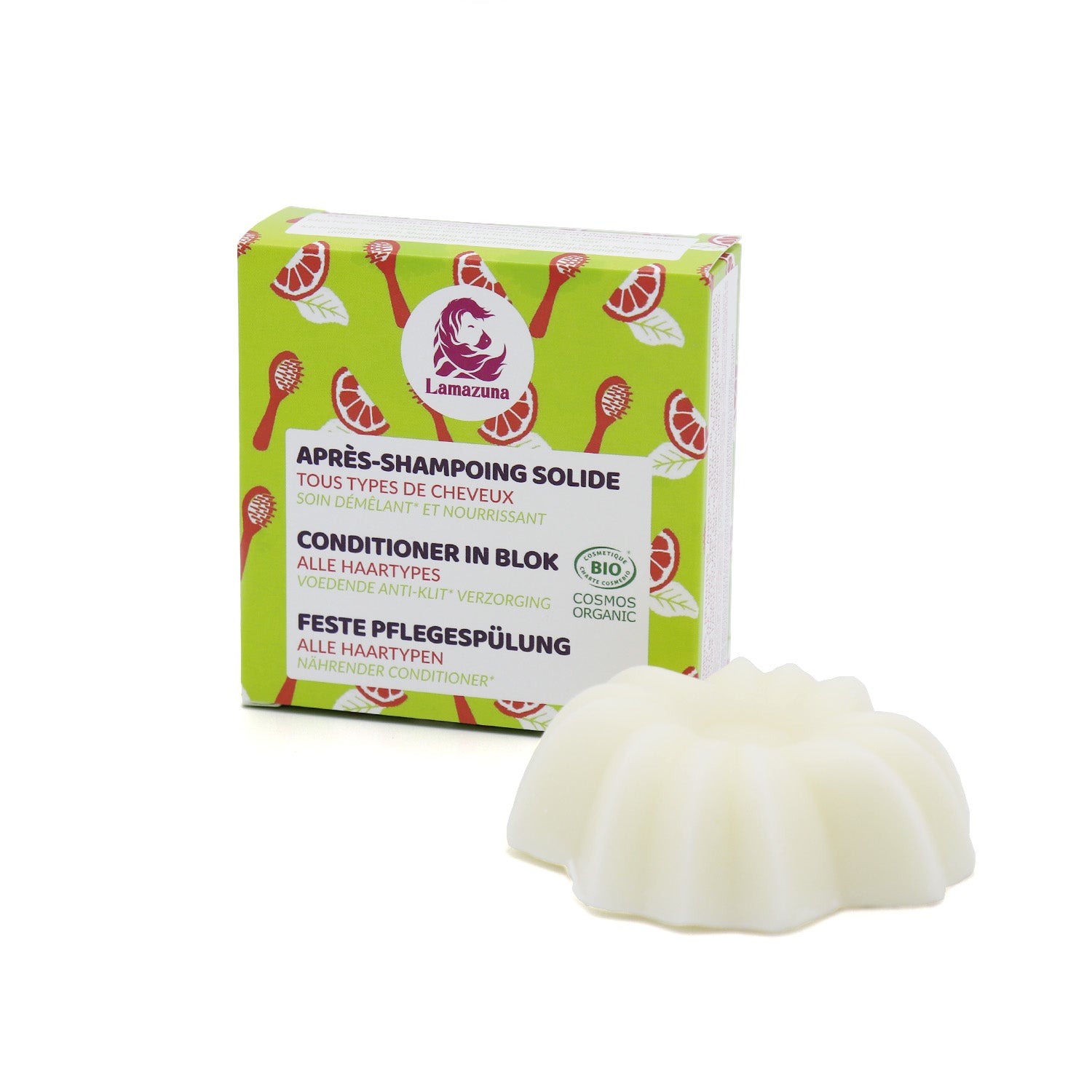 Verpackung und feste Spülung von Lamazuna vor weißem Hintergrund, mit grünem und rosafarbenem Design.