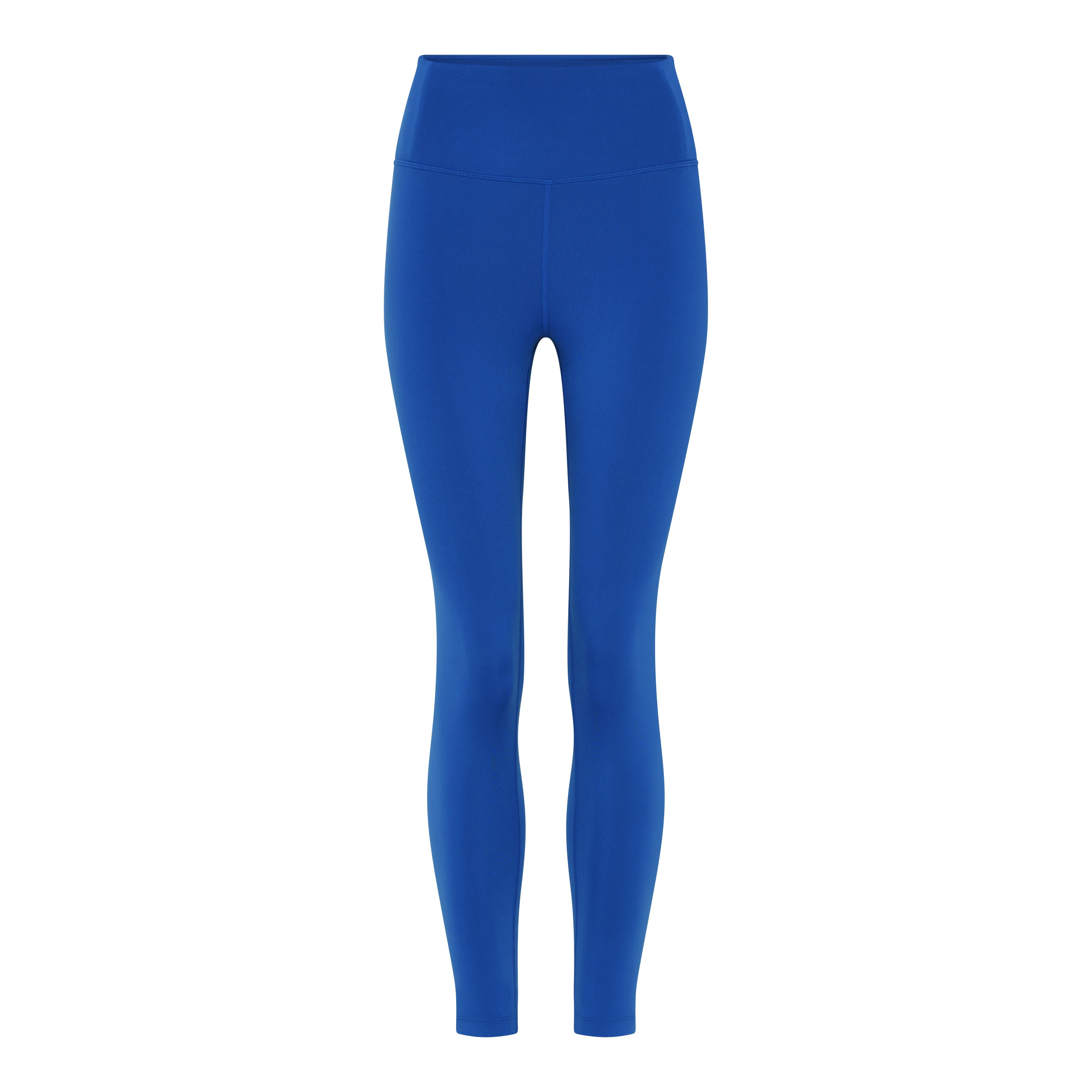 Blaue, hoch taillierte Leggings vor weißem Hintergrund.