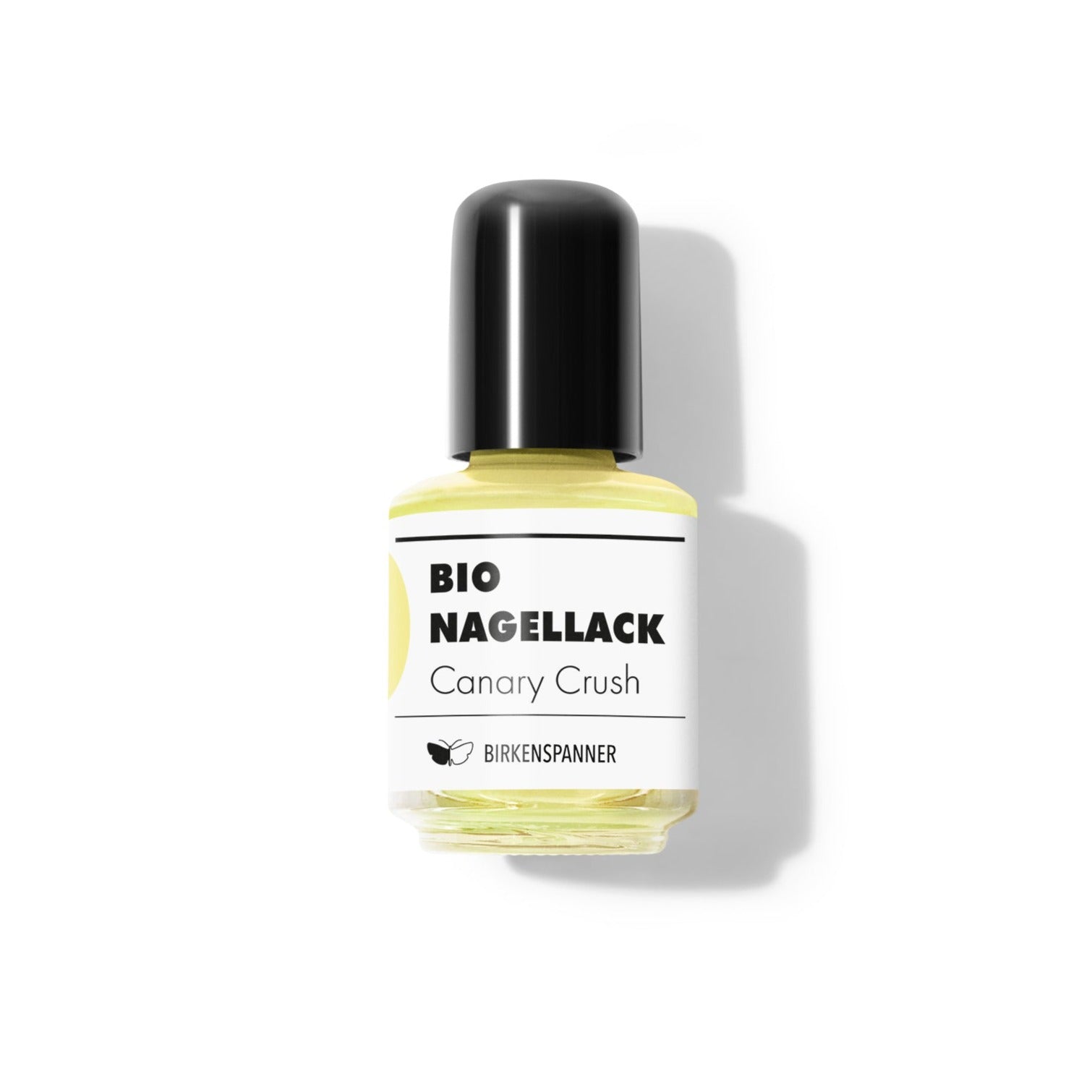 Flasche mit Bio-Nagellack, Farbe „Canary Crush“, schwarzer Verschluss, auf weißem Hintergrund.