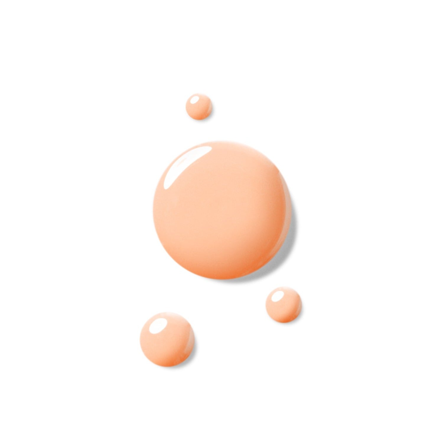 Beige Flüssigkeitstropfen verschiedener Größe auf weißem Hintergrund.