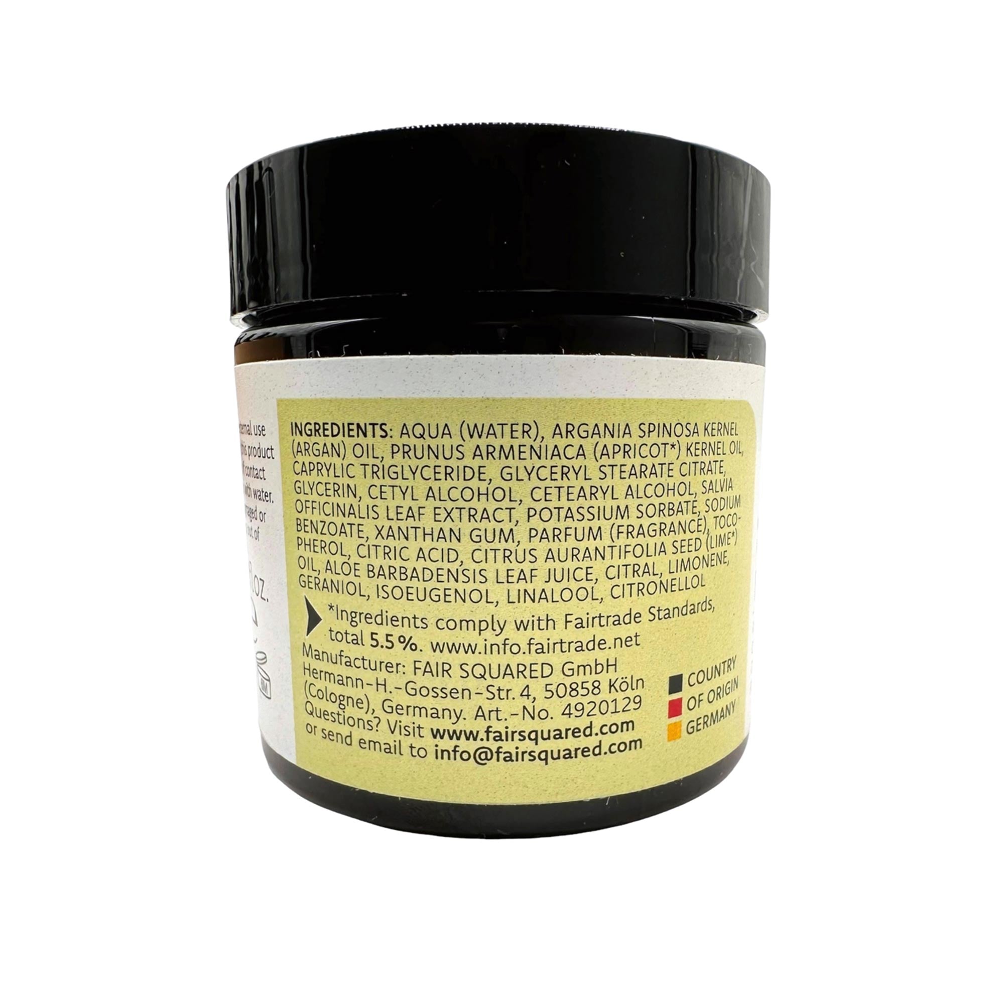 Nahaufnahme eines schwarzen Kosmetiktiegels mit einem beigen Etikett, auf dem Inhaltsstoffe und Herstellerangaben für eine Fair Squared Hautcreme aufgeführt sind. Das Etikett enthält Text in Grün und Schwarz, einschließlich Kontakt- und Herkunftsinformationen.