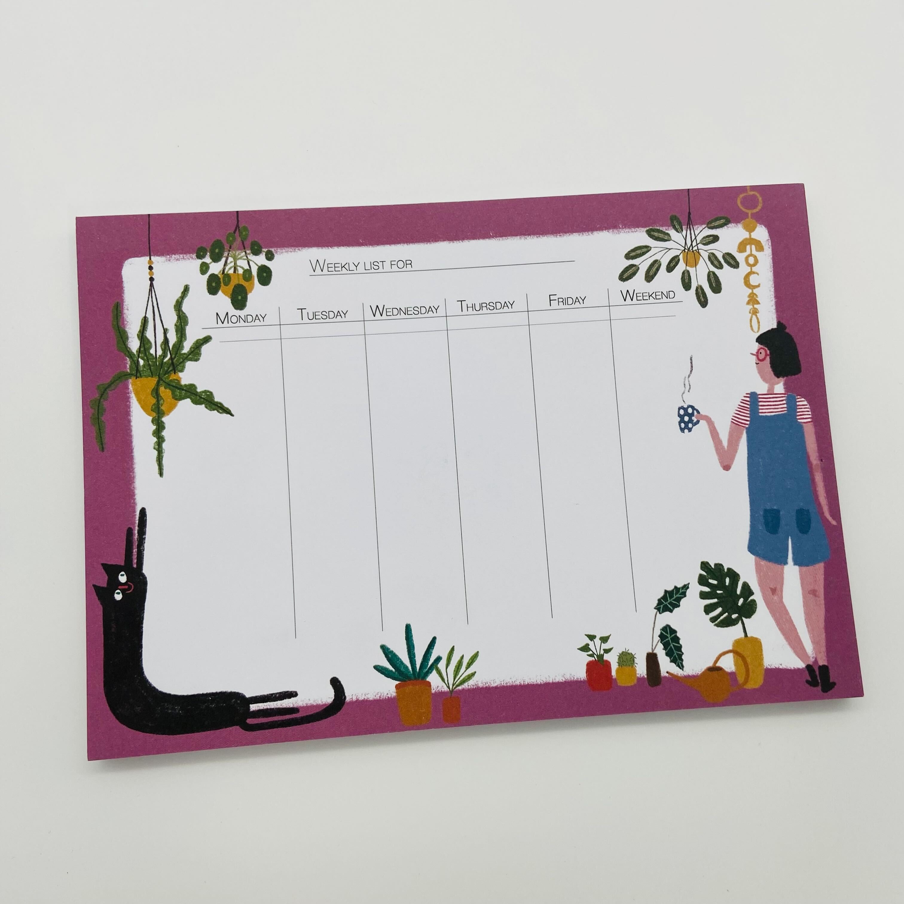 Wochenplaner mit lila Rand und Illustrationen von Pflanzen, einer Person mit Kaffeetasse und einer schwarzen Katze.