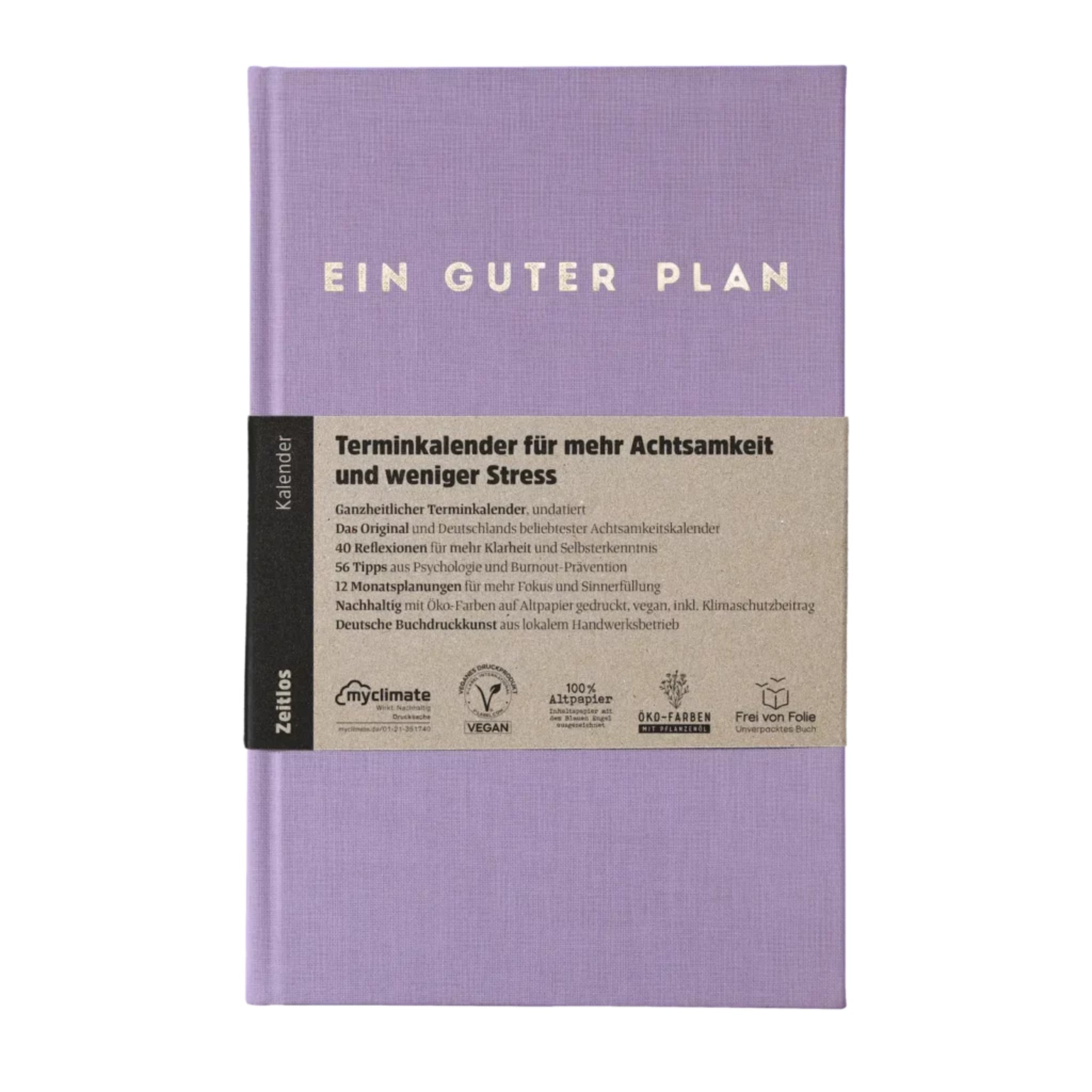 Lila Buch mit dem Titel "Ein Guter Plan" und einer Banderole mit Informationen zum achtsamen Terminkalender.