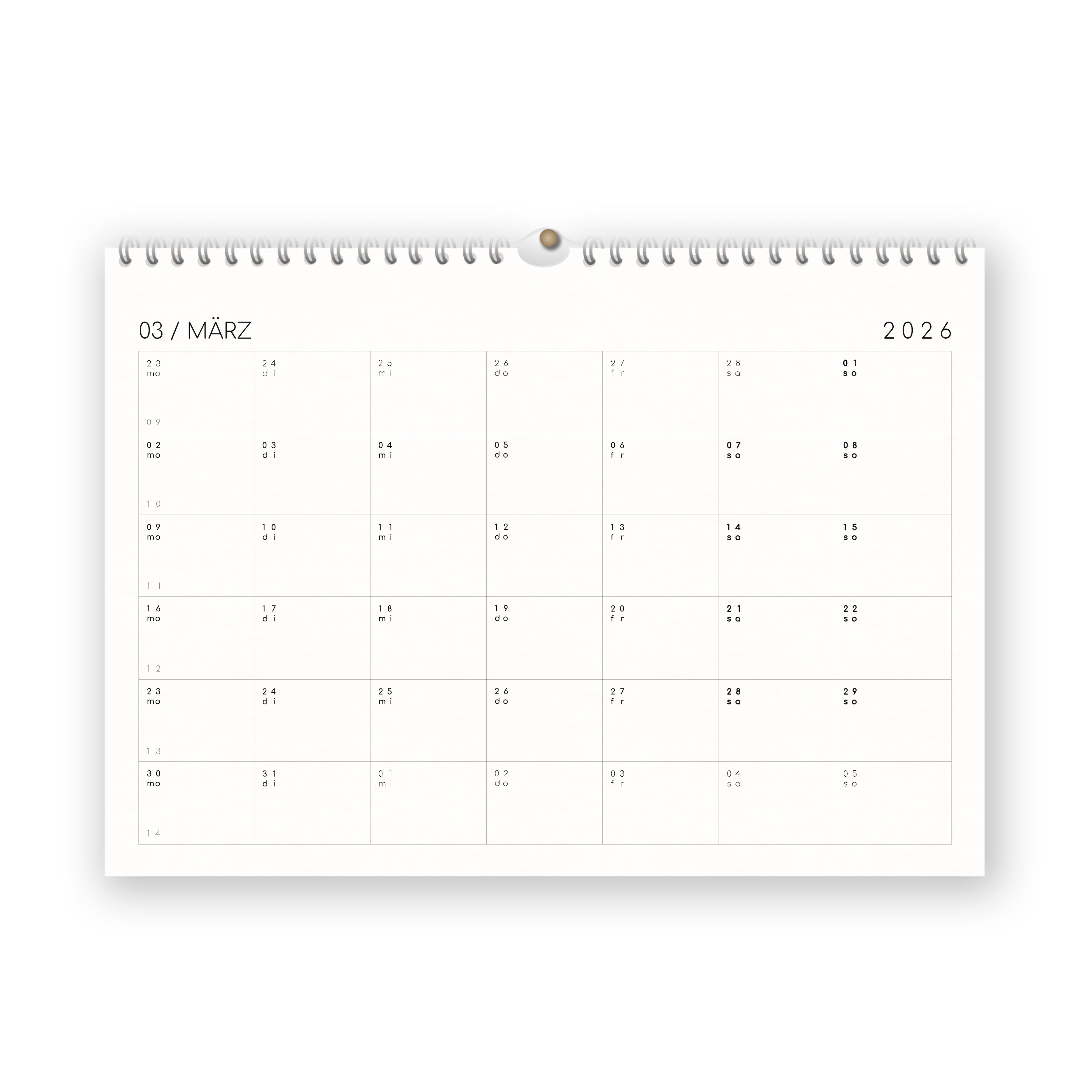Ein Wandkalender, der den März 2026 in deutscher Sprache anzeigt (März). Die Daten sind in einem Raster angeordnet, mit Markierungen in Blindenschrift an jedem Datum. Der Kalender ist oben spiralförmig gebunden.