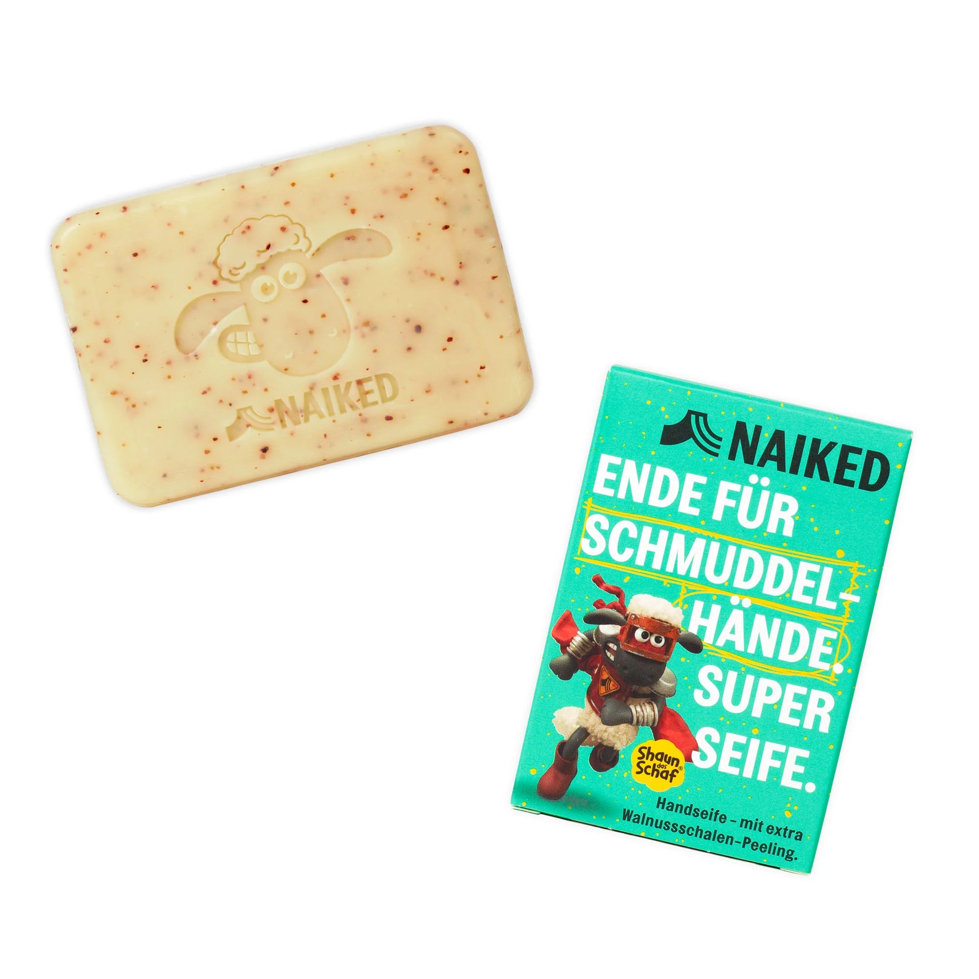 Eine Seife mit eingeprägtem Schafmotiv neben einer Verpackung mit der Aufschrift "NAIKED ENDE FÜR SCHMUDDELHÄNDE".