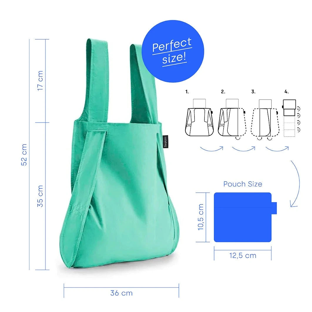 Grüne tragbare Einkaufstasche mit Größenangaben in cm und Faltanleitung auf der rechten Seite, beschriftet als "Perfect size!".