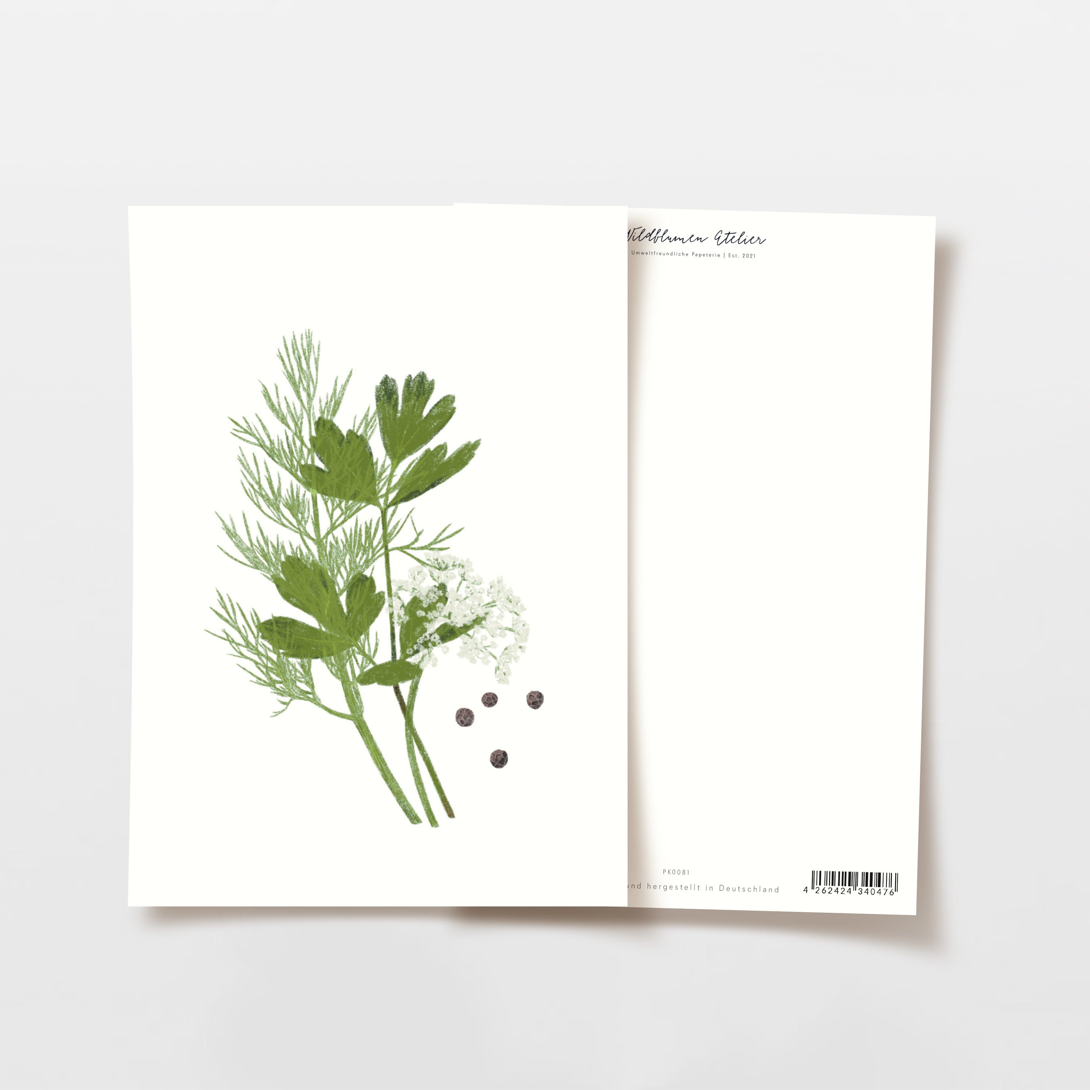 Zwei Karten, eine mit einem Dill- und Holunder-Design, daneben eine leere Rückseite mit Text und Barcode.