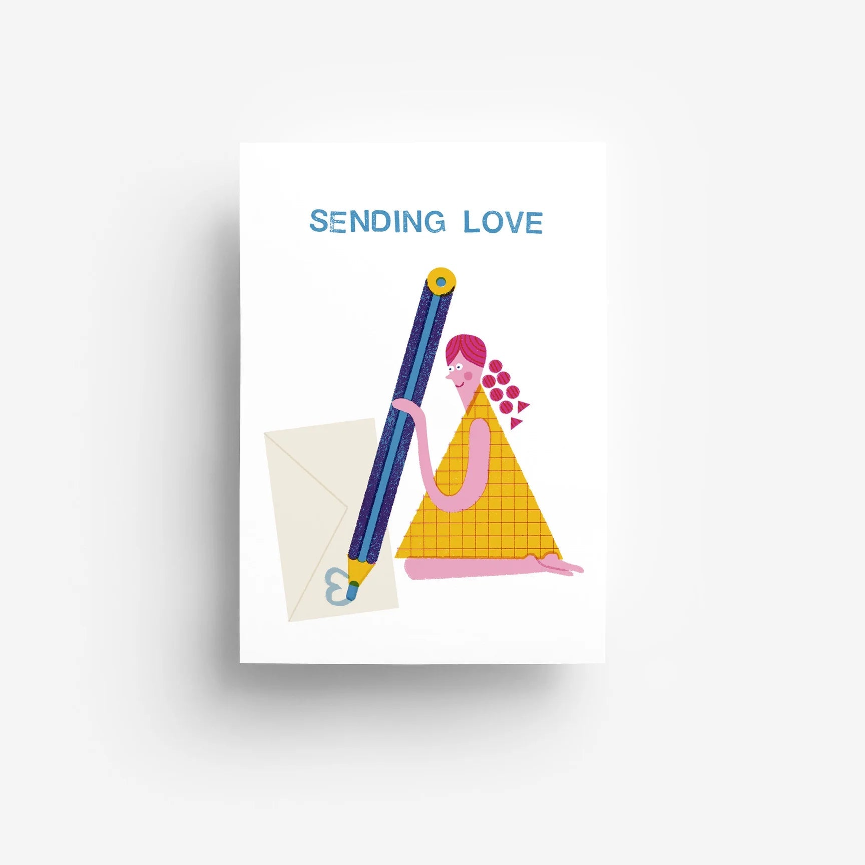 Eine Karte mit der Aufschrift Sending Love zeigt eine illustrierte Person mit rosa Haaren, die einen großen blauen Stift hält und auf einen Umschlag schreibt. Der Hintergrund ist weiß und minimalistisch.
