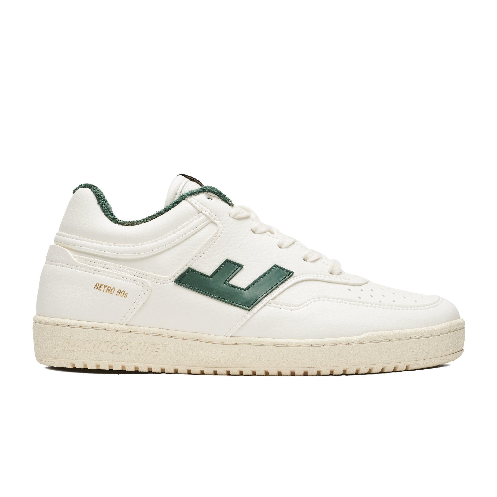 Weißer Sneaker im Retro-Stil mit grünen Akzenten und dickem Sohlenprofil.