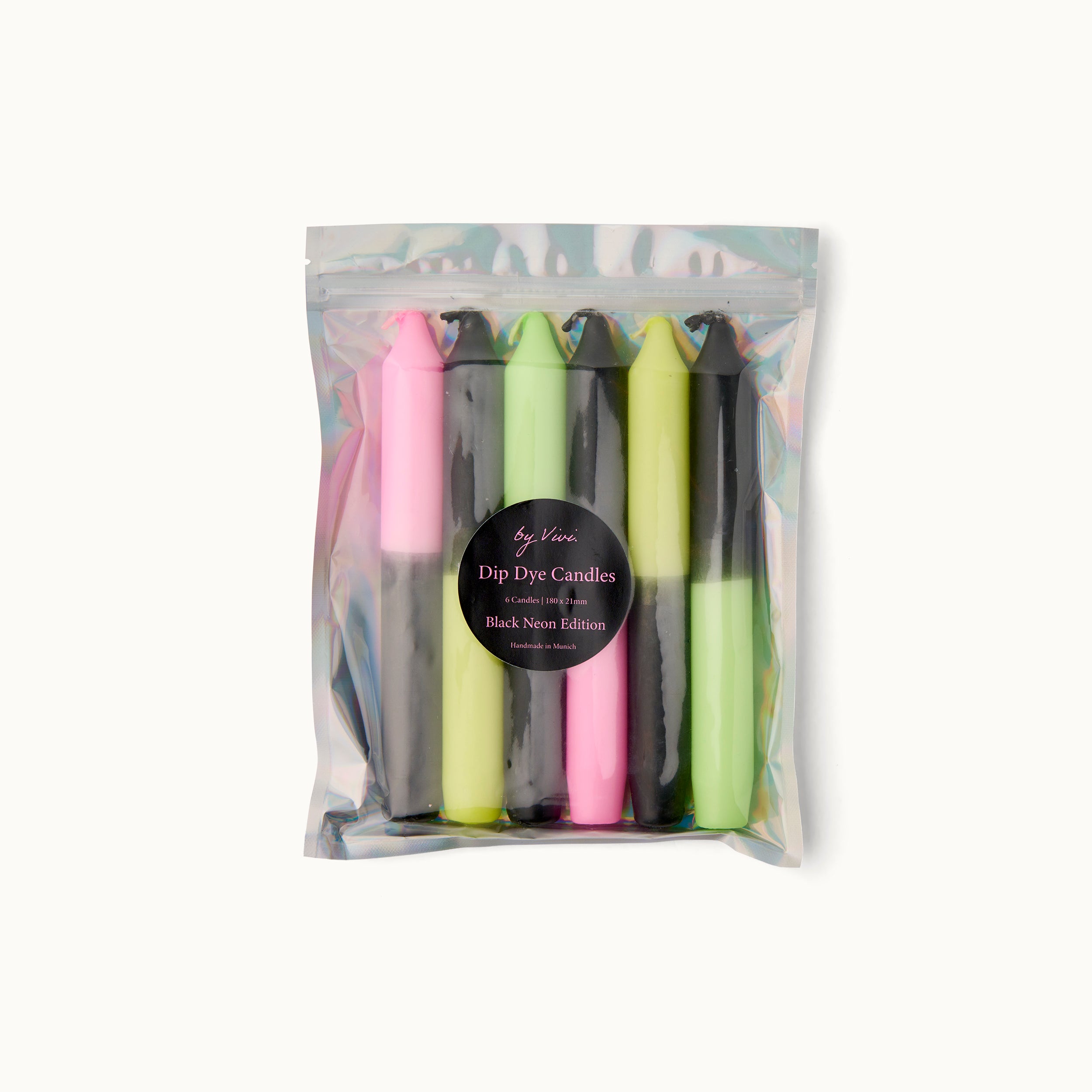 Packung mit vier farbigen Dip-Dye-Kerzen in einer transparenten Verpackung, Etikett mit der Aufschrift "Black Neon Edition".
