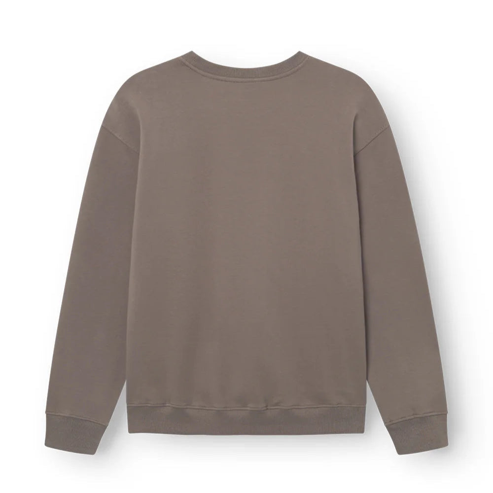 Beigefarbener Pullover ohne sichtbare Muster, von hinten fotografiert.