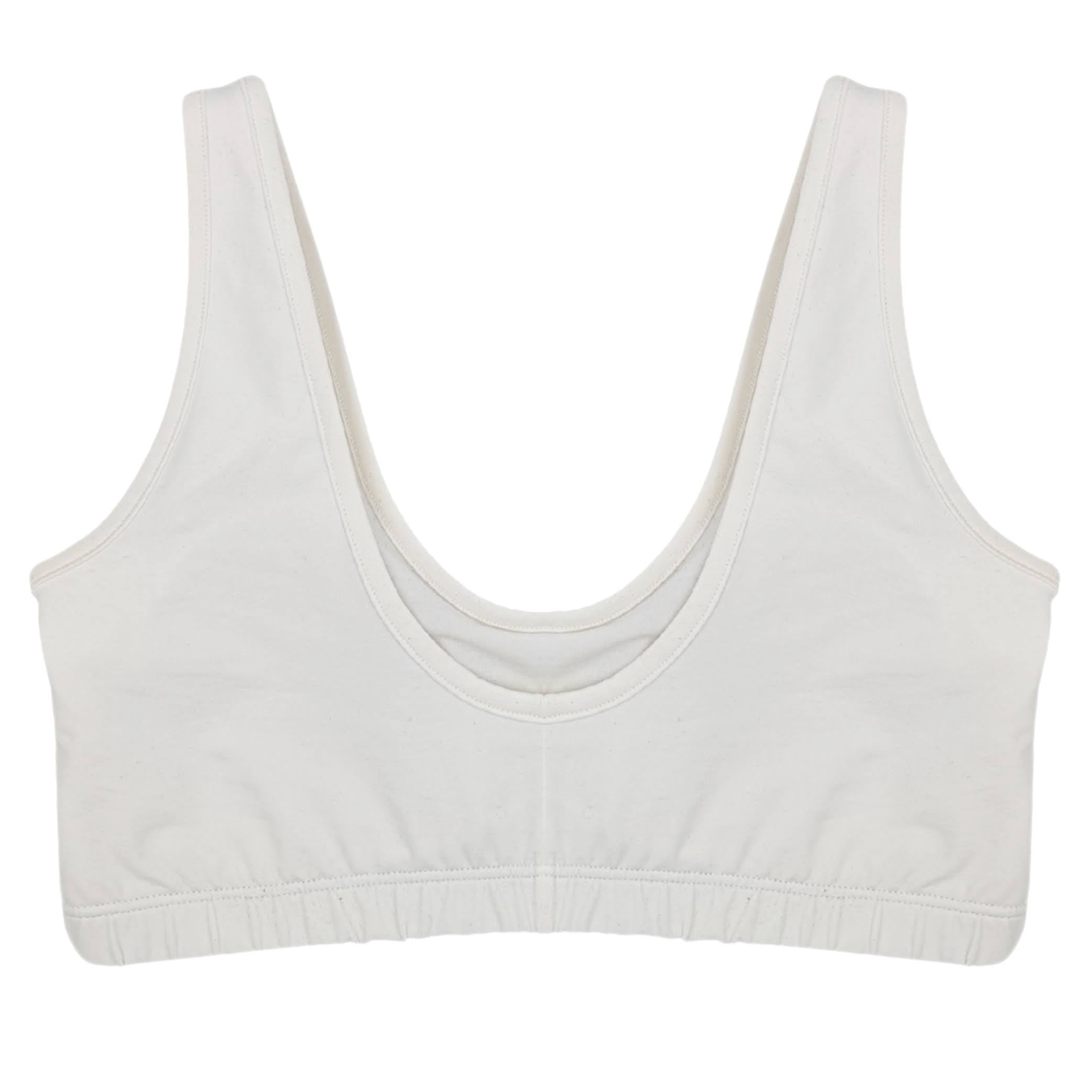 Weißes Sport-BH-Oberteil flach auf weißem Hintergrund liegend.