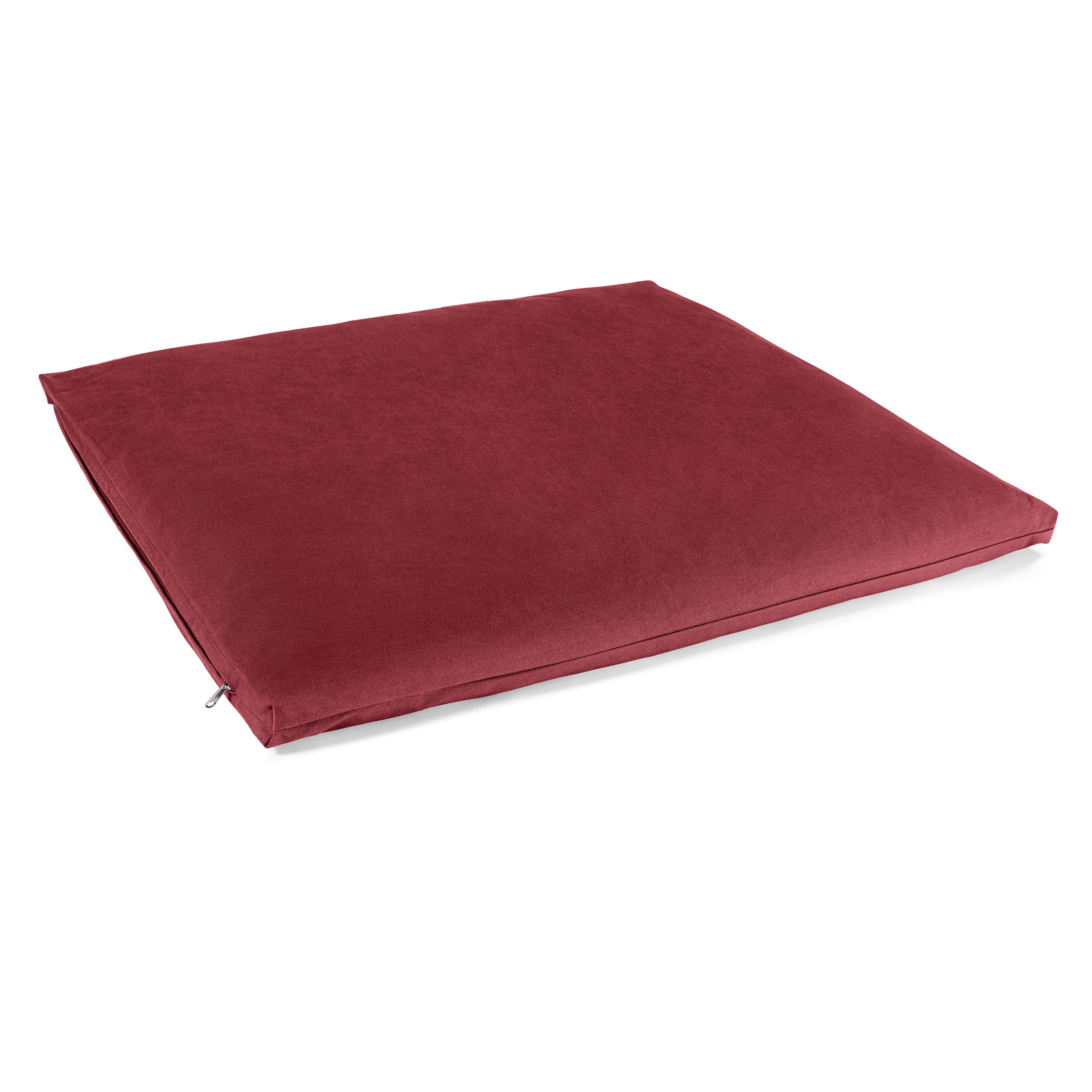Rotes Kissen mit glattem Bezug und sichtbarem Reißverschluss an der Seite, auf weißem Hintergrund.