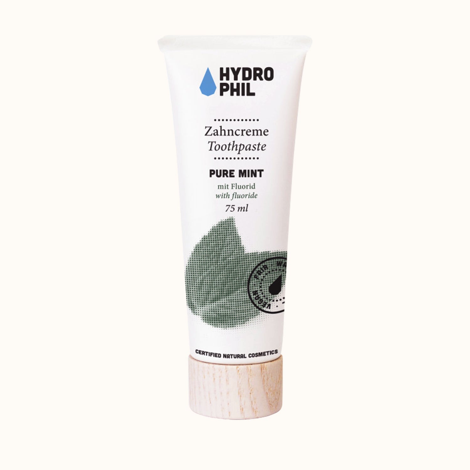 Weiße Zahnpastatube mit Holzdeckel, Aufschrift "Zahncreme Toothpaste Pure Mint, mit Fluorid, 75 ml".