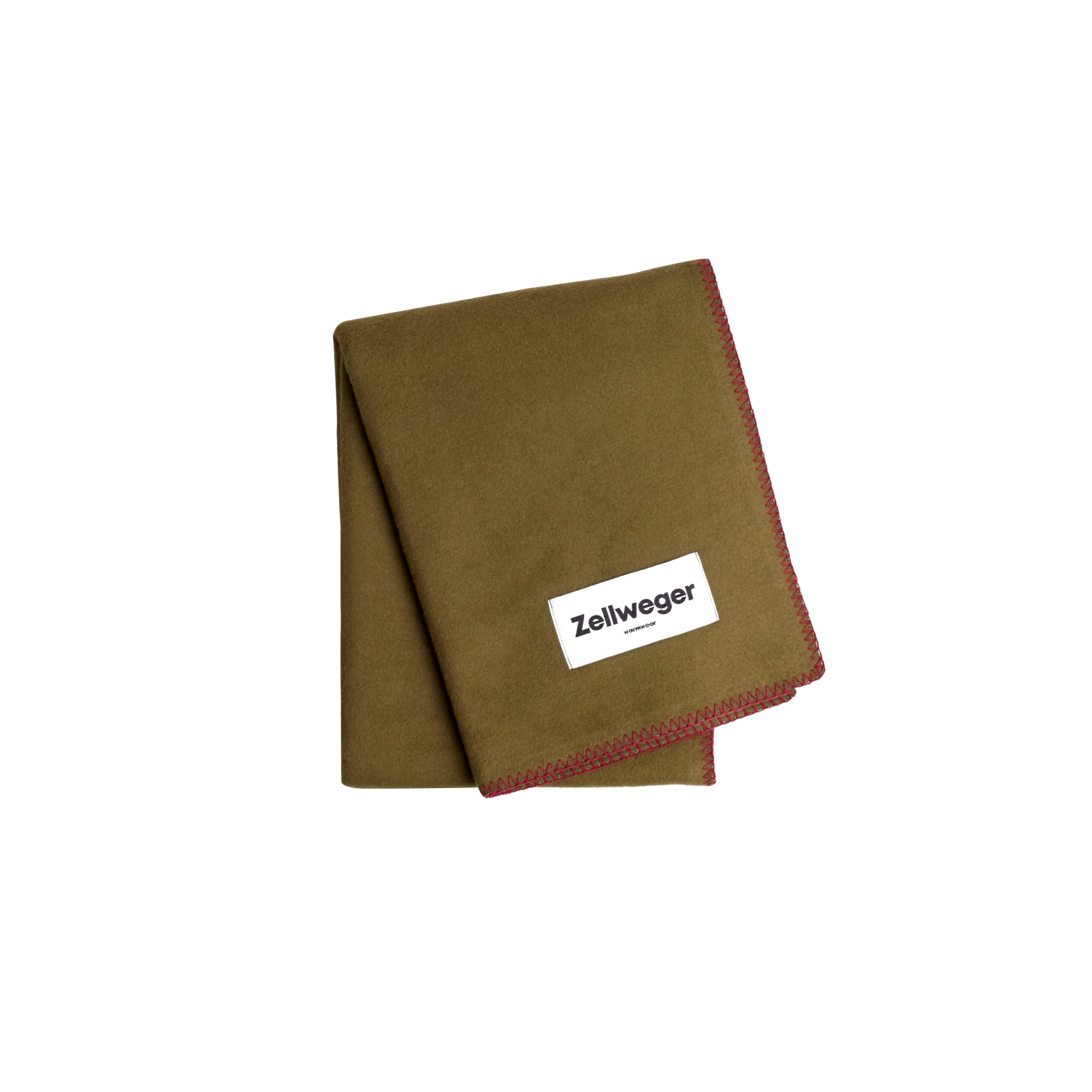 Braune Decke mit rotem Rand und einem weißen Etikett, das "Zellweger" zeigt.