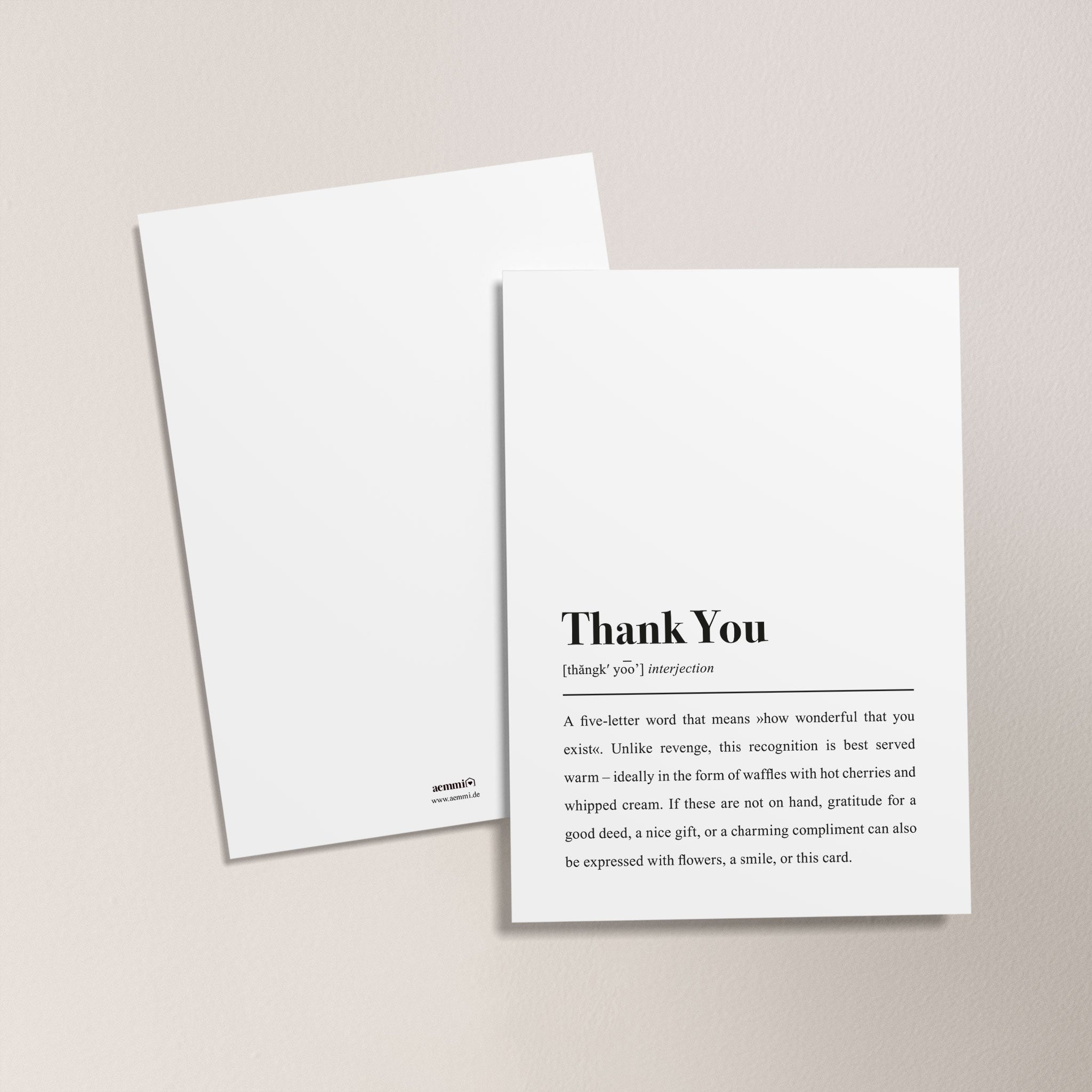 Zwei weiße Karten auf einem hellen Hintergrund, eine mit dem Text "Thank You" und einer Definition darunter.
