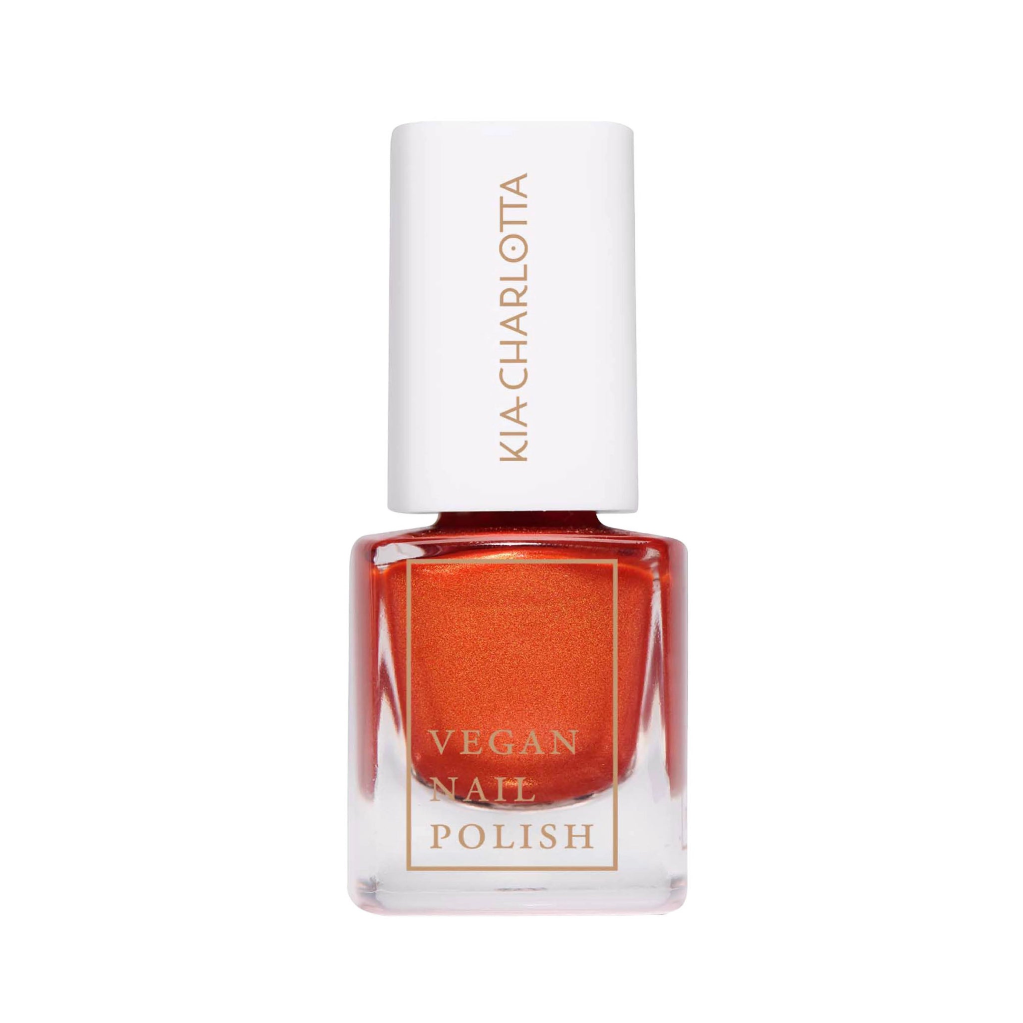 Eine Flasche veganer Nagellack in leuchtendem Orange mit weißem Deckel und goldener Beschriftung.