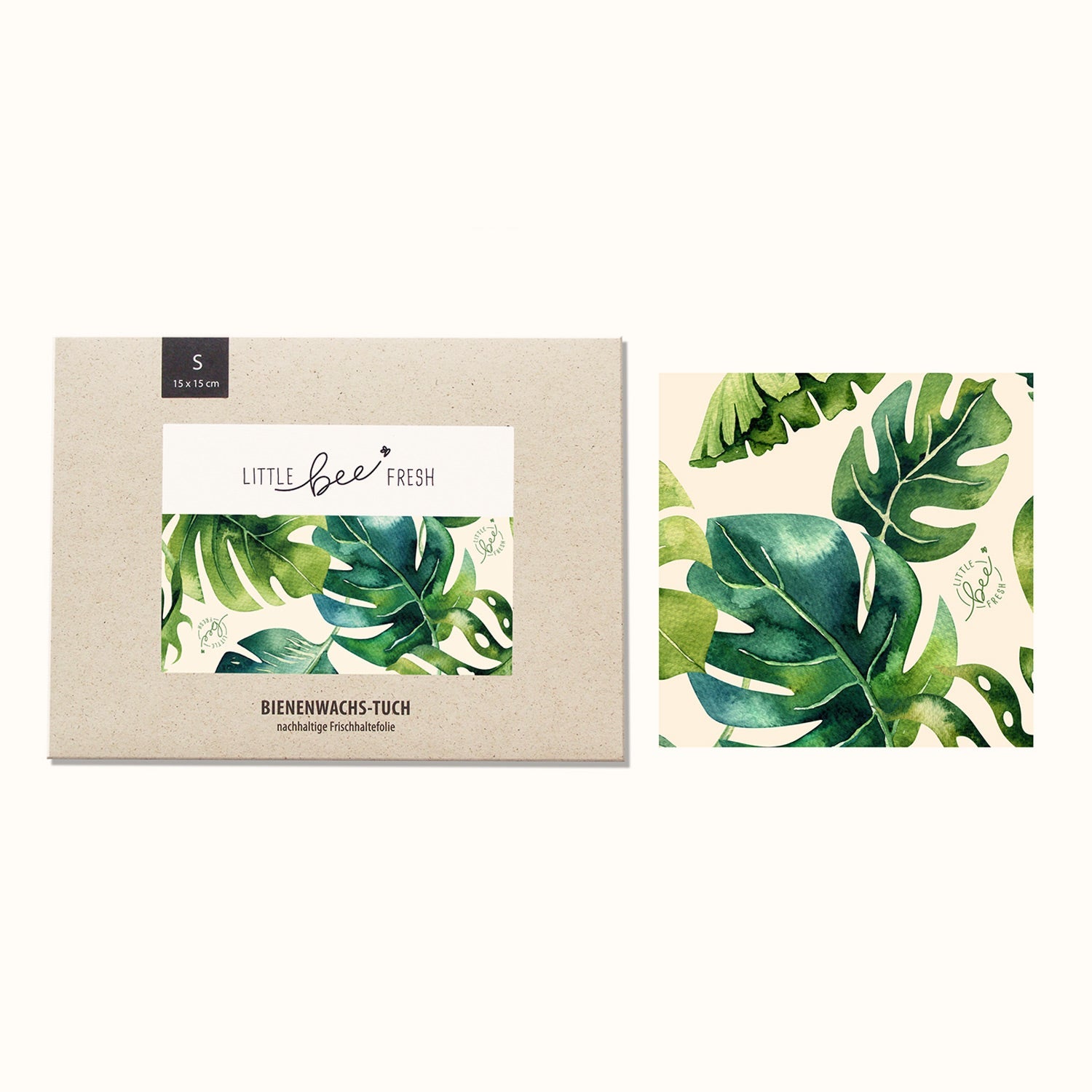 Verpackung und Muster eines Bienenwachstuchs mit grünen Blättern auf beigem Hintergrund.