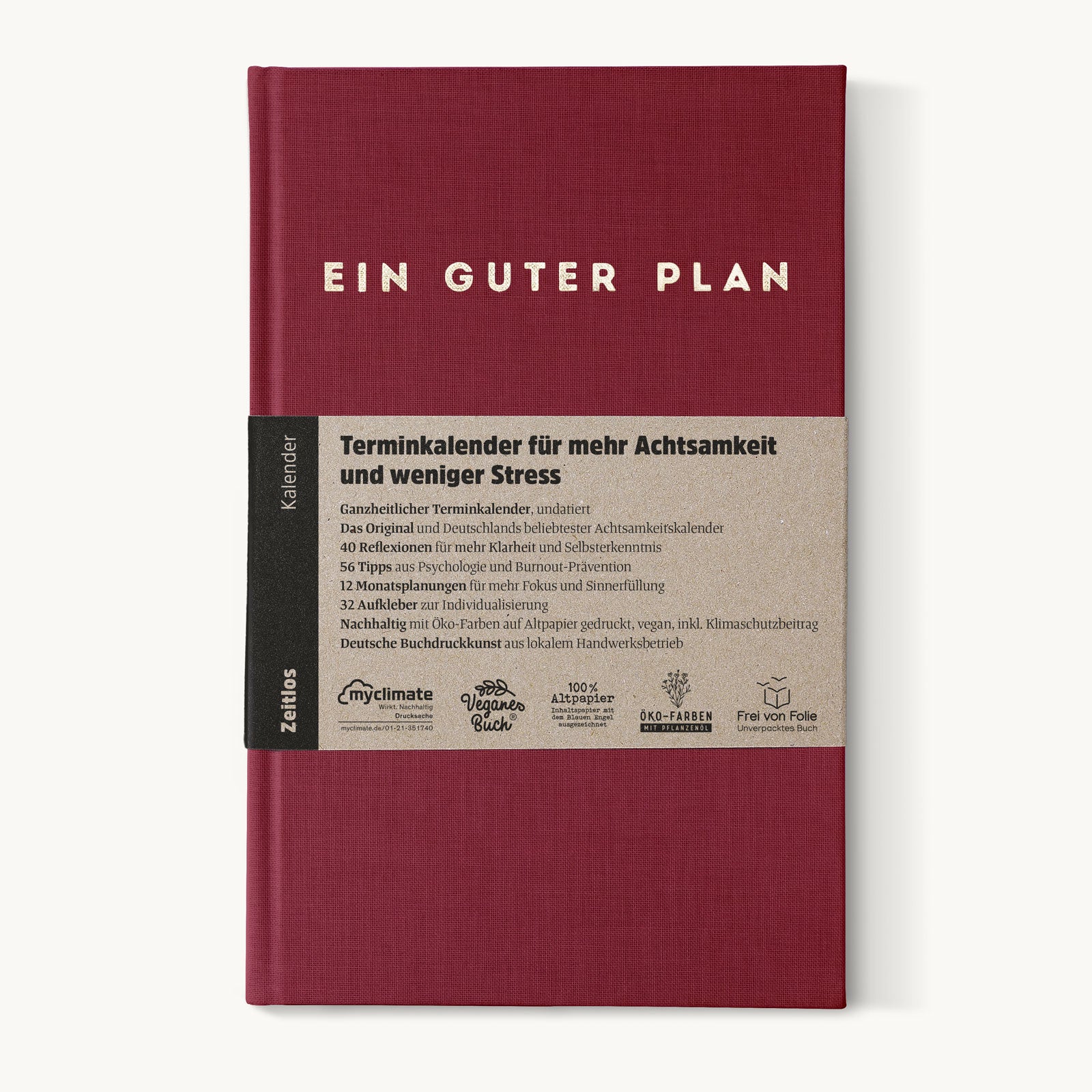 Roter Kalender mit der Aufschrift "Ein Guter Plan" und Infobanderole über Achtsamkeit und Nachhaltigkeit.