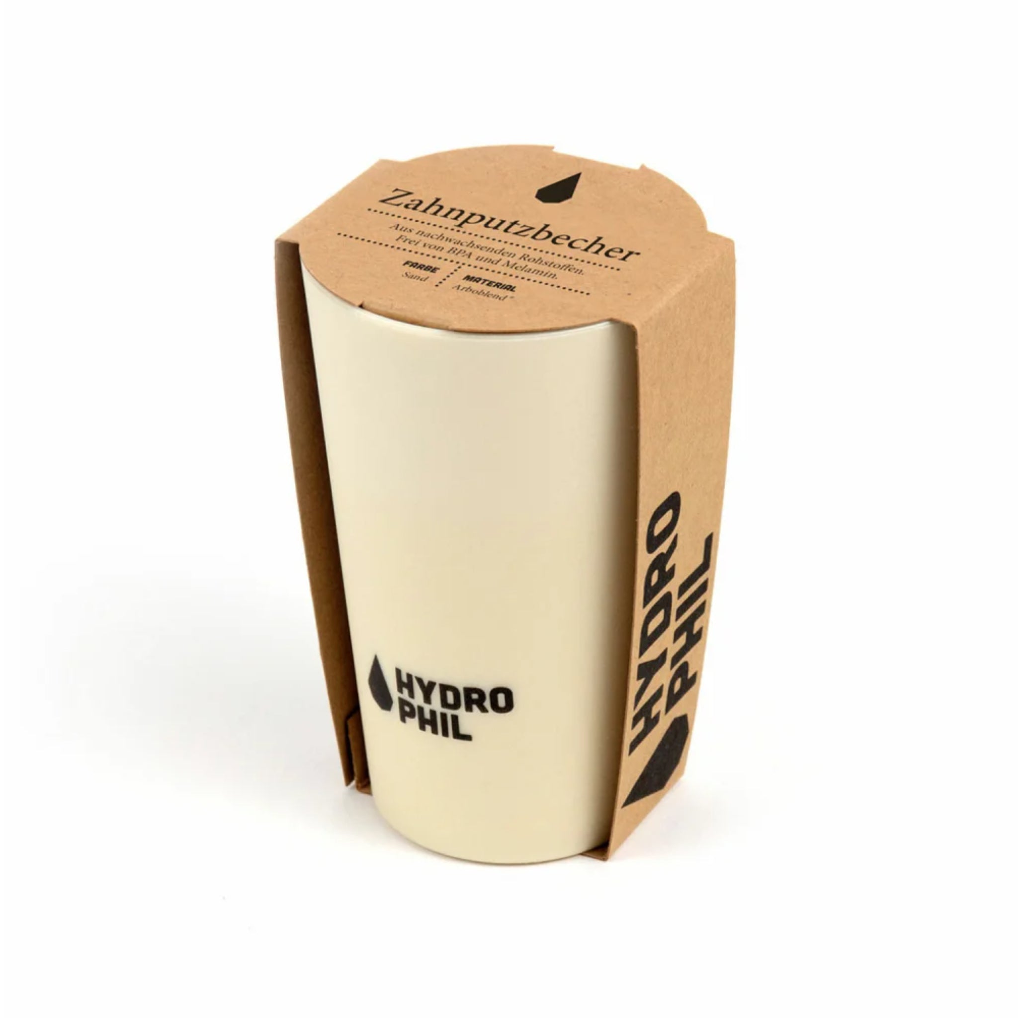 Beiger Zahnputzbecher mit schwarzem "Hydrophil"-Logo und nachhaltiger Kartonverpackung auf weißem Hintergrund.