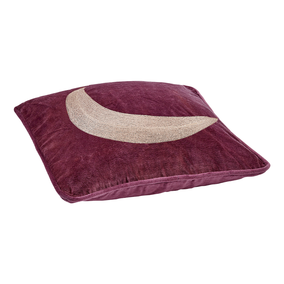 Lilafarbenes Kissen mit einem beigen Halbmond-Muster in der Mitte.