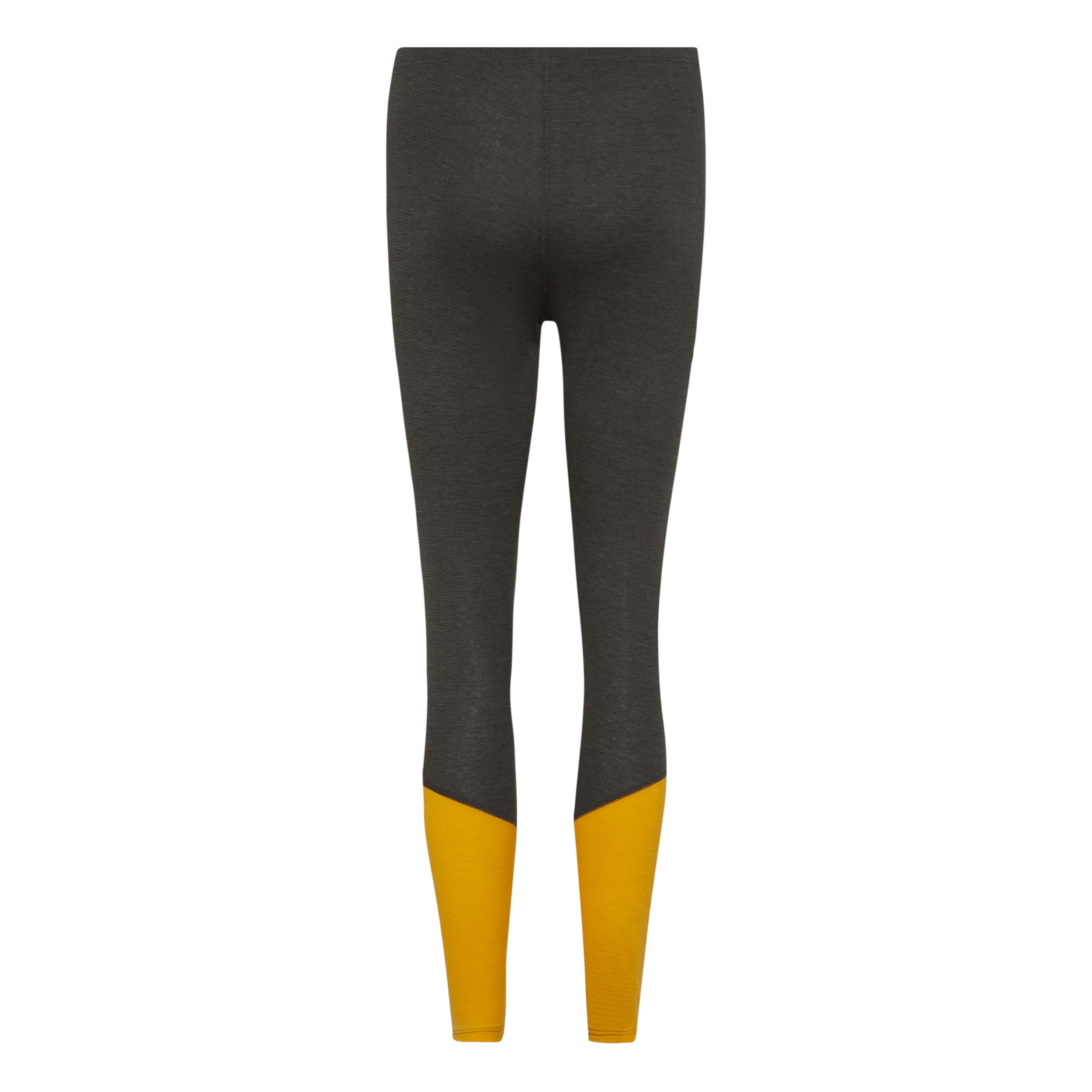 Dunkelgraue Leggings mit hoher Taille und leuchtend gelben Farbblöcken an den Unterschenkeln auf weißem Hintergrund.