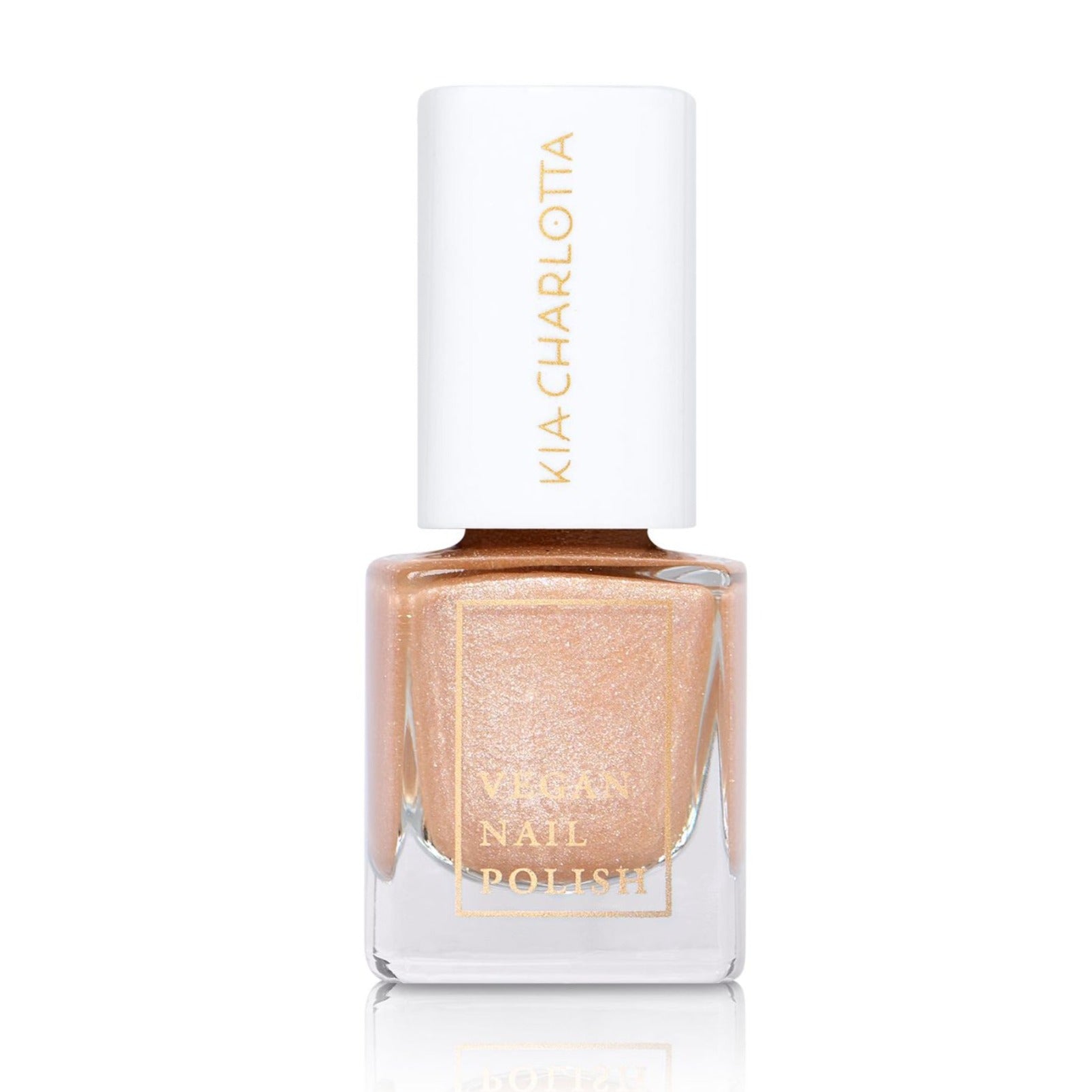 Goldener Nagellackflakon mit weißem Deckel und der Aufschrift "Vegan Nail Polish".