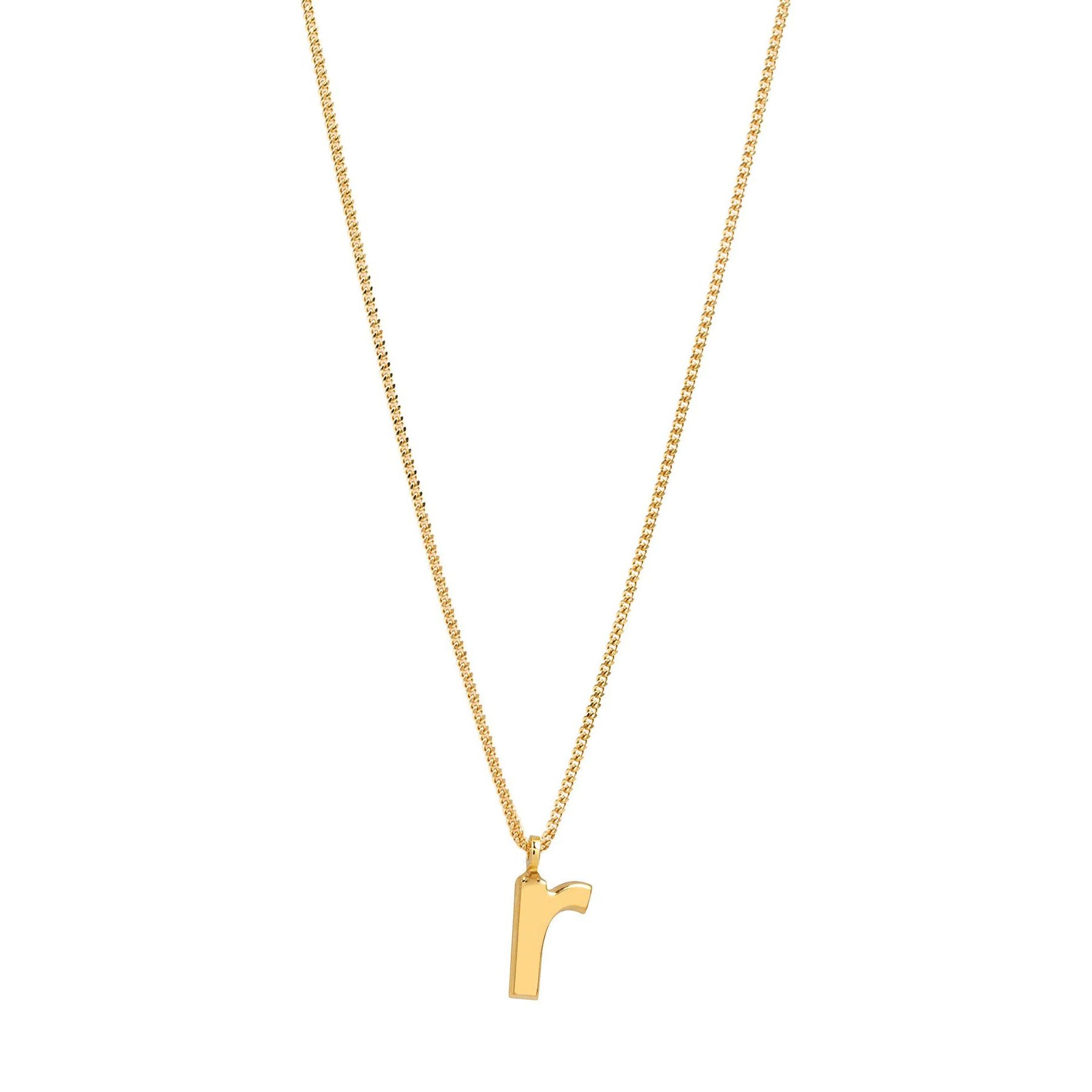 Eine goldene Halskette mit einer zarten Kette trägt einen Anhänger mit dem Kleinbuchstaben r.