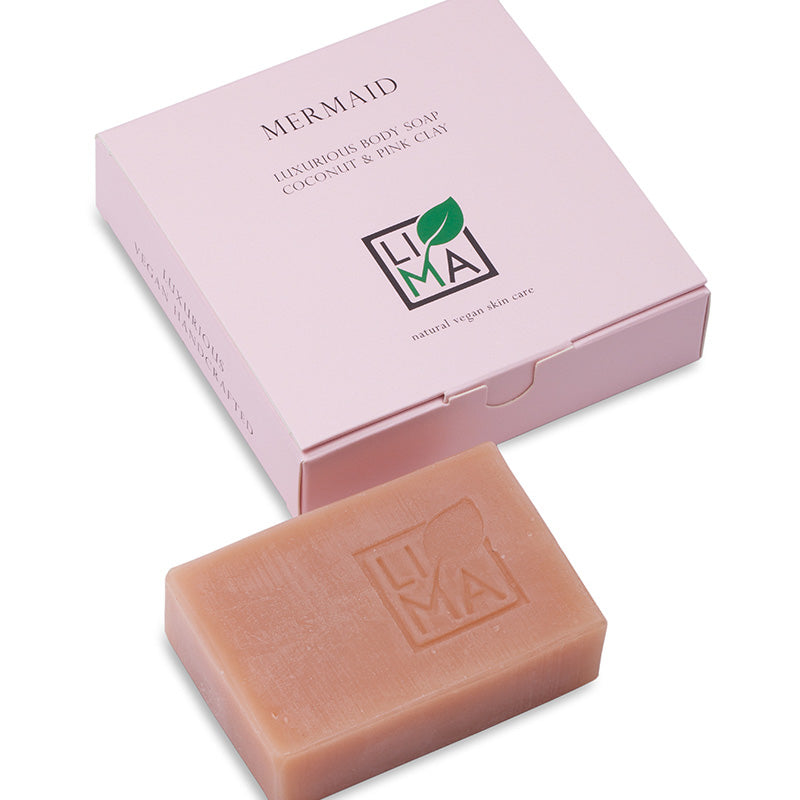 Rosa Seife mit einer Schachtel, beschriftet als luxuriöse Körperseife mit Kokosnuss und rosa Tonerde von LIMA.