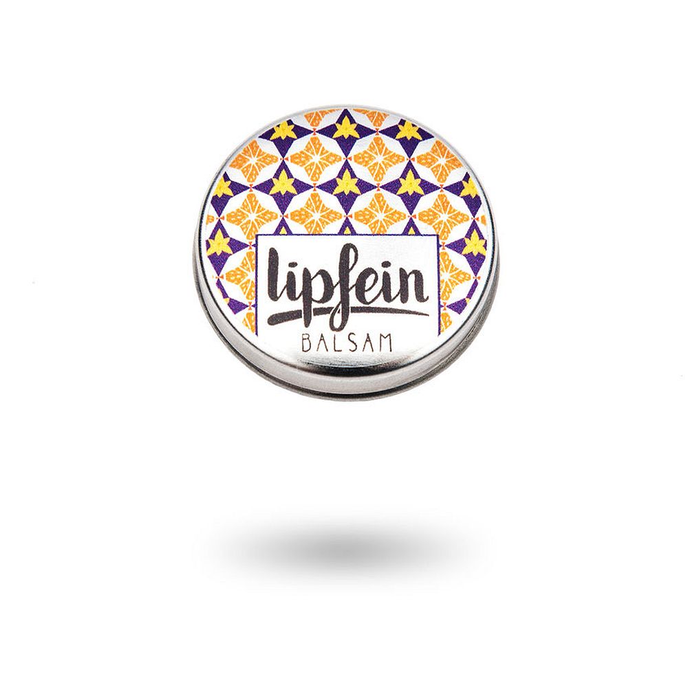Runde Dose mit farbenfrohem Muster, beschriftet mit "Lipfein Balsam".
