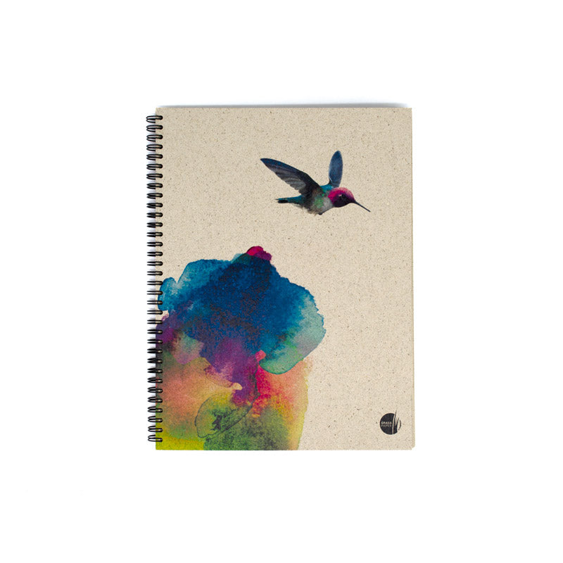 Spiralgebundenes Notizbuch mit Kolibri und buntem Farbklecks auf dem Cover.