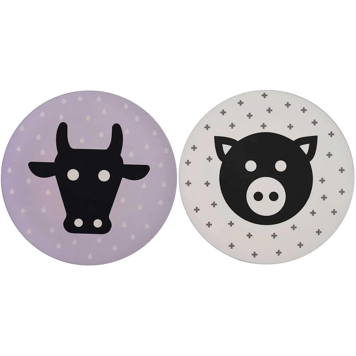 Zwei runde Untersetzer mit Tiermotiven: links ein Stierkopf auf lila, rechts ein Schweinekopf auf weißem Hintergrund.