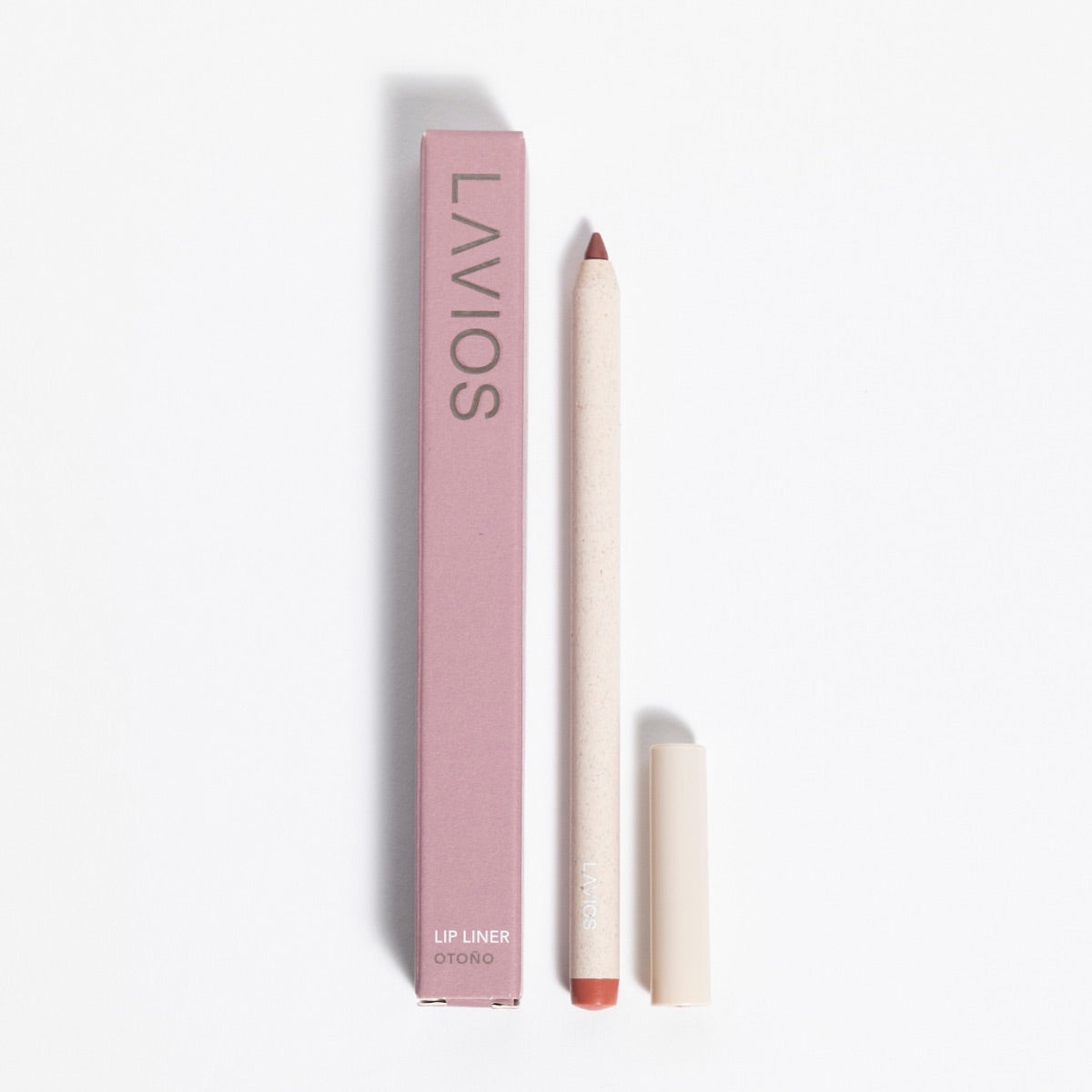 Ein Lippenkonturenstift und seine Verpackung mit der Aufschrift "LAVIOS Lip Liner Otono" auf weißem Hintergrund.