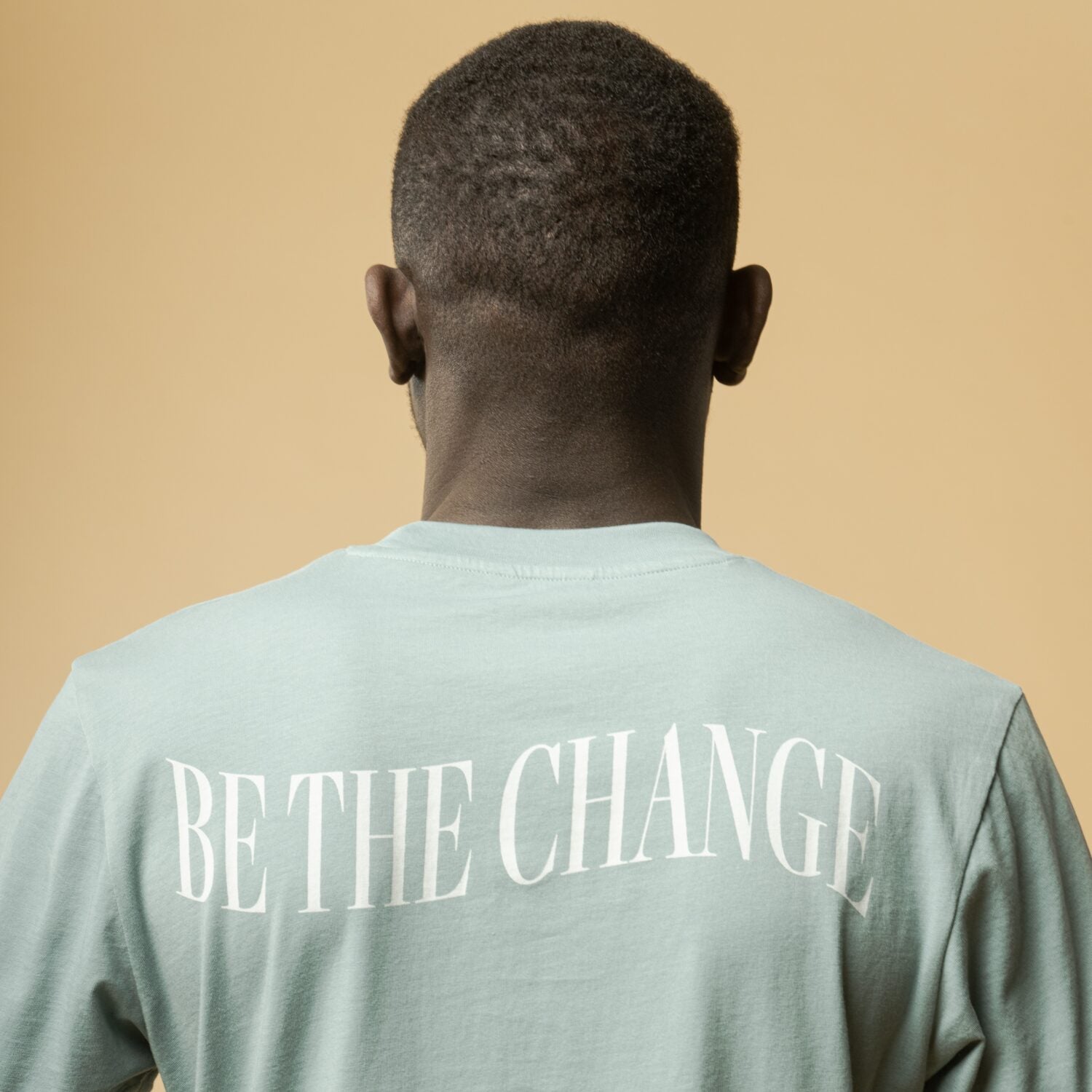 MELA Herren T-Shirt "AVAN" BE THE CHANGE - sage-druck cream