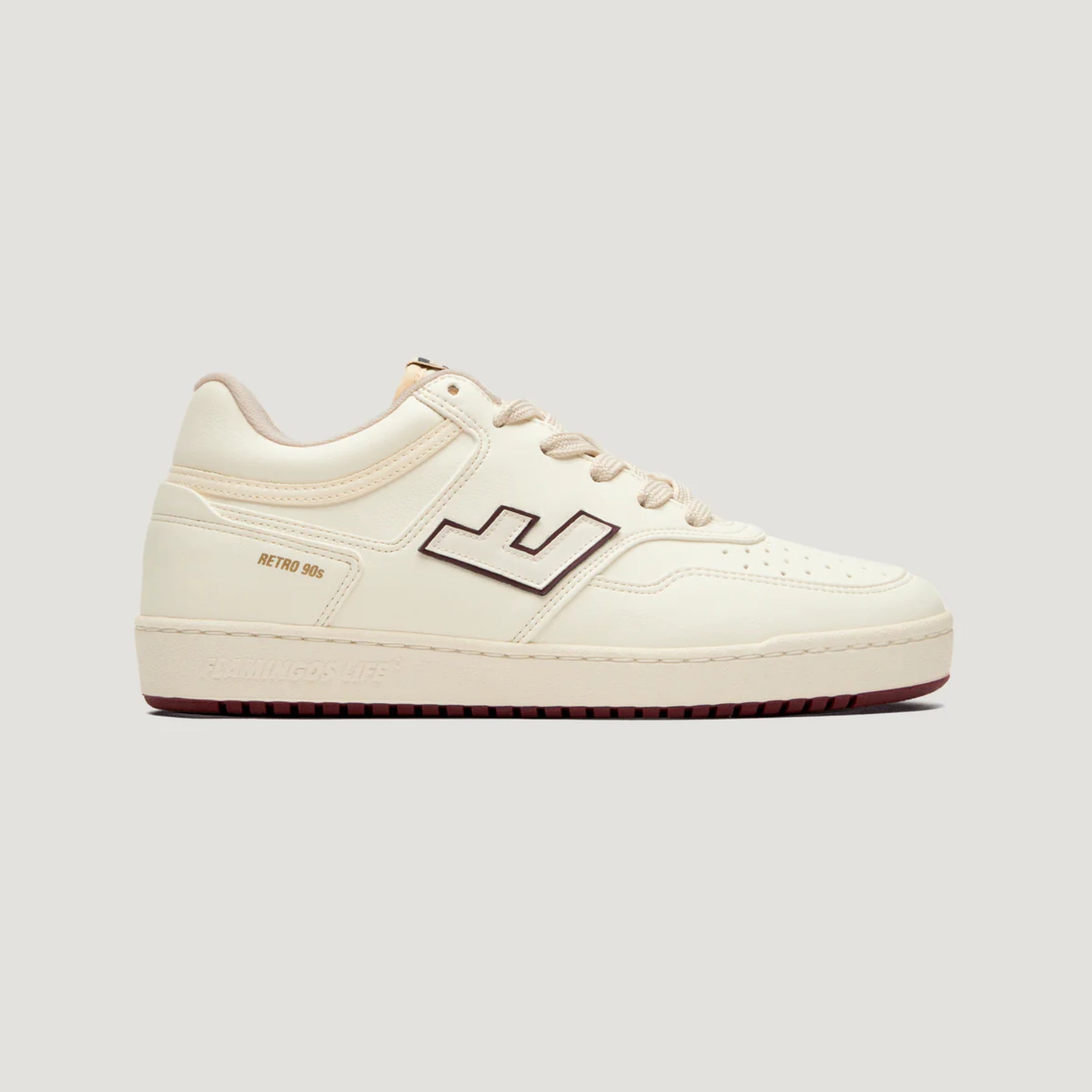 Beiger Retro-Sneaker von Flamingos Life mit braunen Akzenten, seitlichem Logo und der Aufschrift "RETRO 90s".