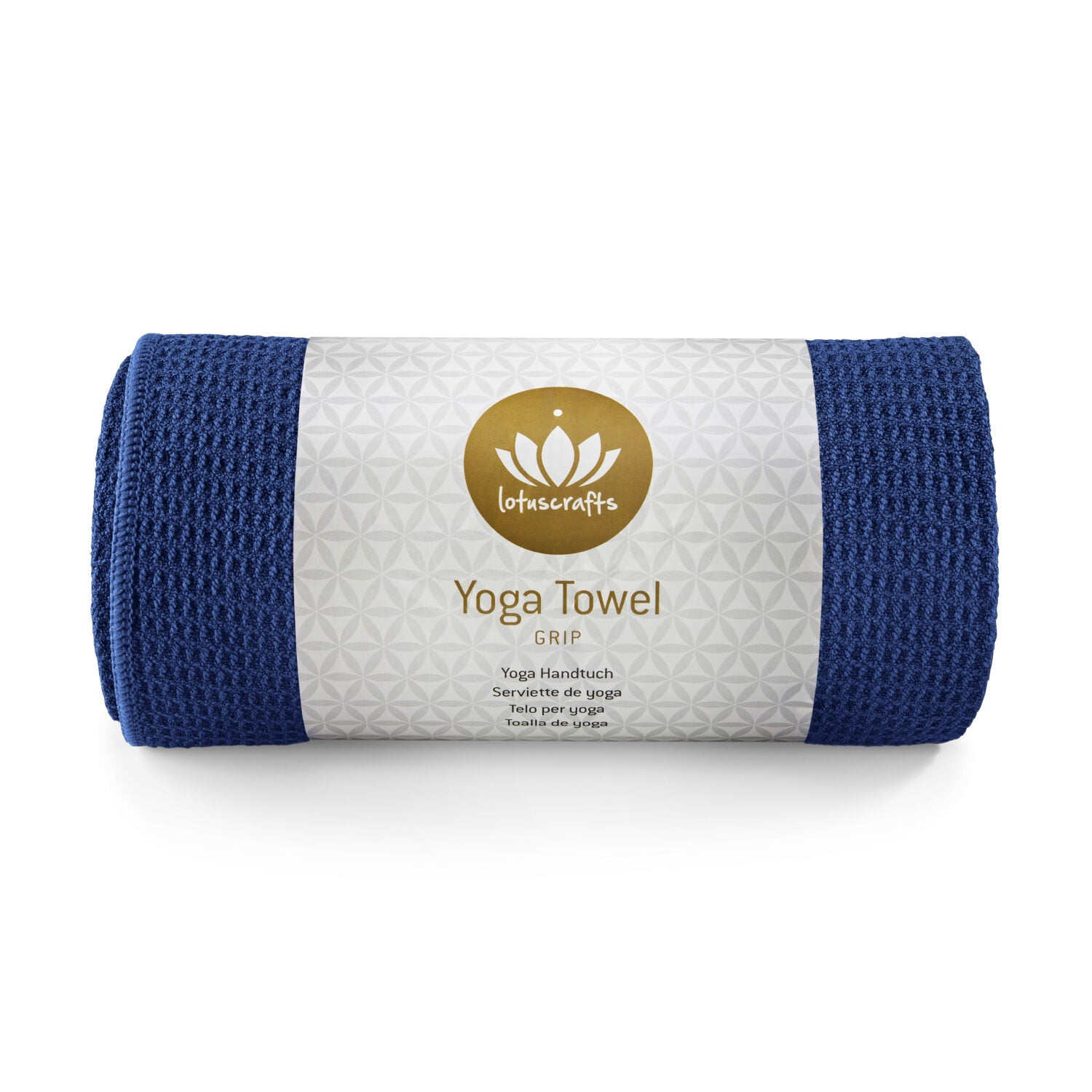 Eine aufgerollte blaue Yoga-Handtuch von Lotuscrafts mit weißem Etikett und goldfarbenem Logo.