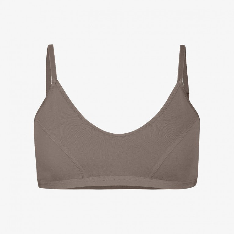 Brauner, minimalistischer BH mit verstellbaren Trägern vor weißem Hintergrund.