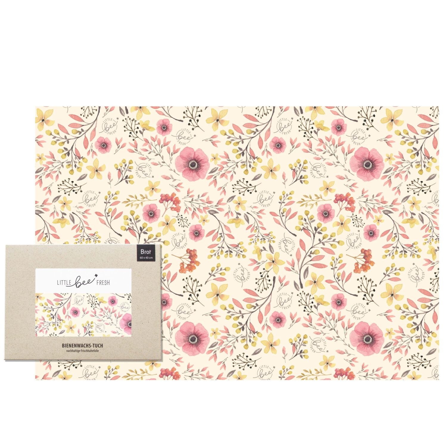 Bienenwachstuch mit floralem Muster in Rosa und Gelb, verpackt in einer Pappschachtel mit Sichtfenster.