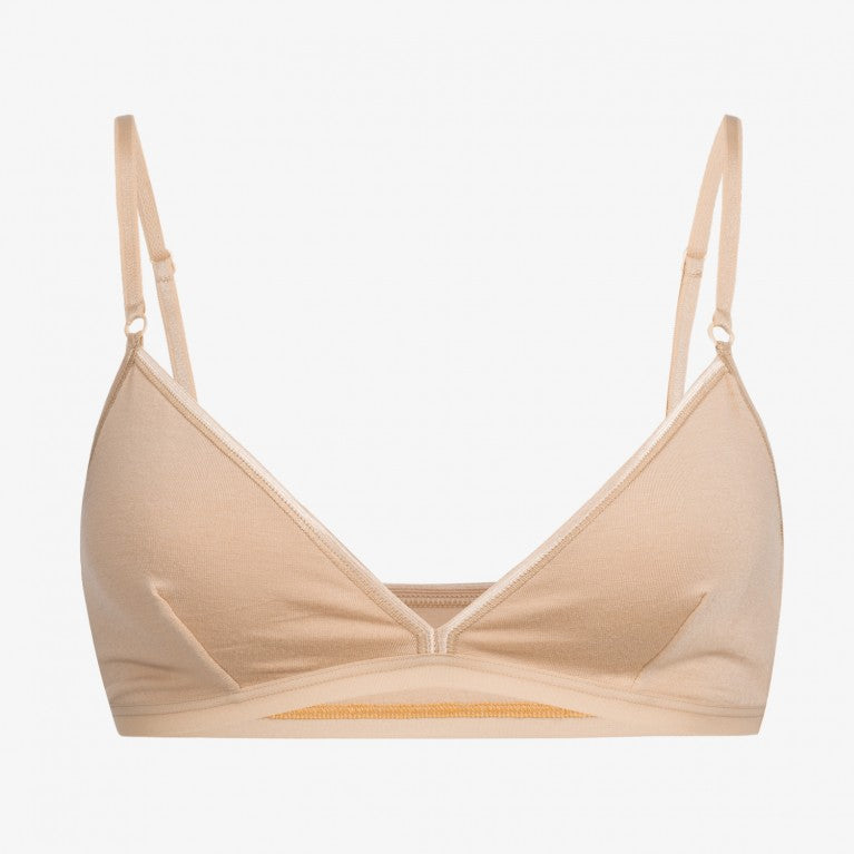 Beige Bralette mit dünnen Trägern, schlichtes Design, vor weißem Hintergrund.