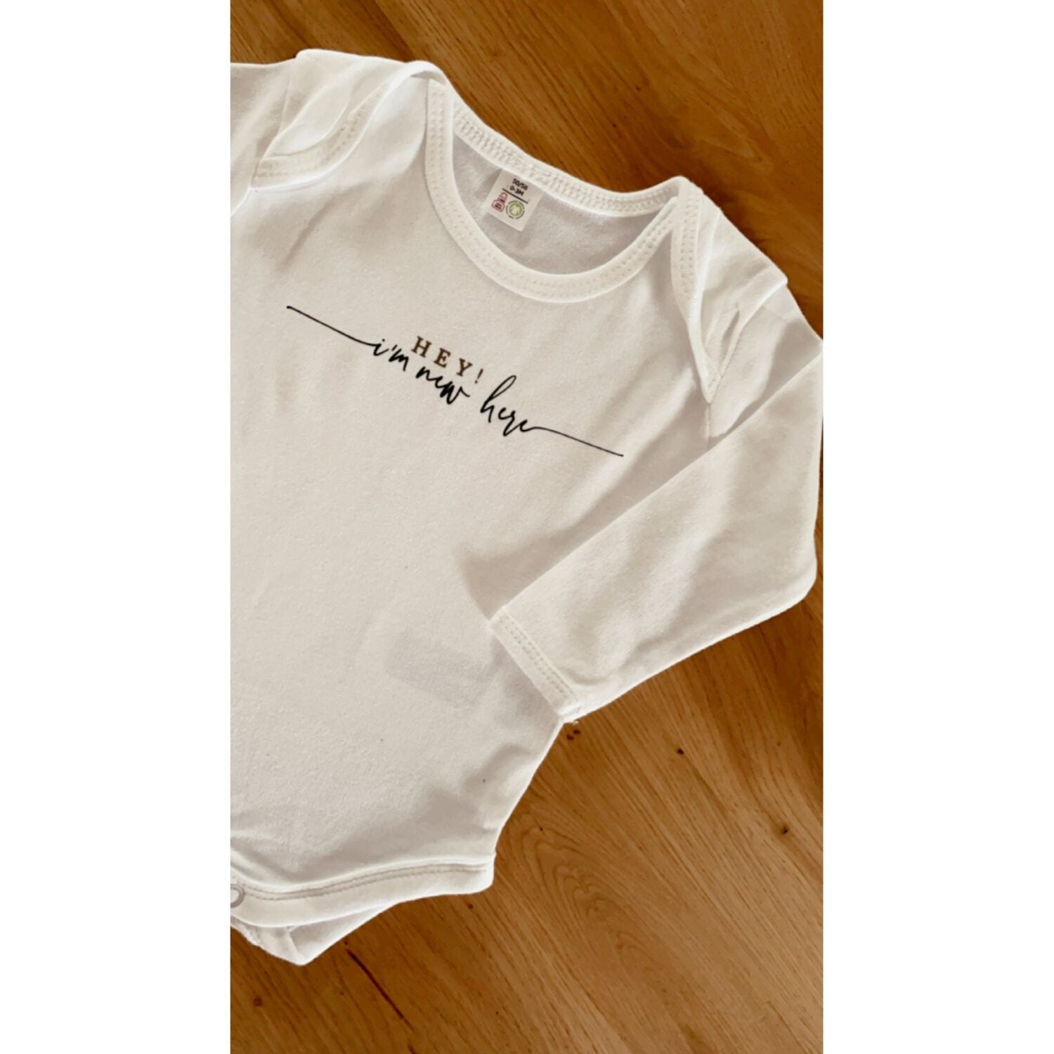 miniliebe Langarm Babybody "Hey! I'm new here"