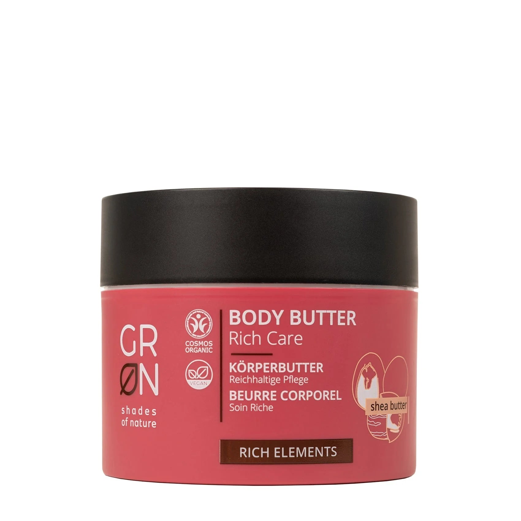 Ein rosafarbener und brauner Tiegel der GRN Body Butter Rich Care mit der Aufschrift Sheabutter und Rich Elements. Auf der Verpackung befinden sich Logos für die Bio-Zertifizierung und Produktinformationen in mehreren Sprachen.