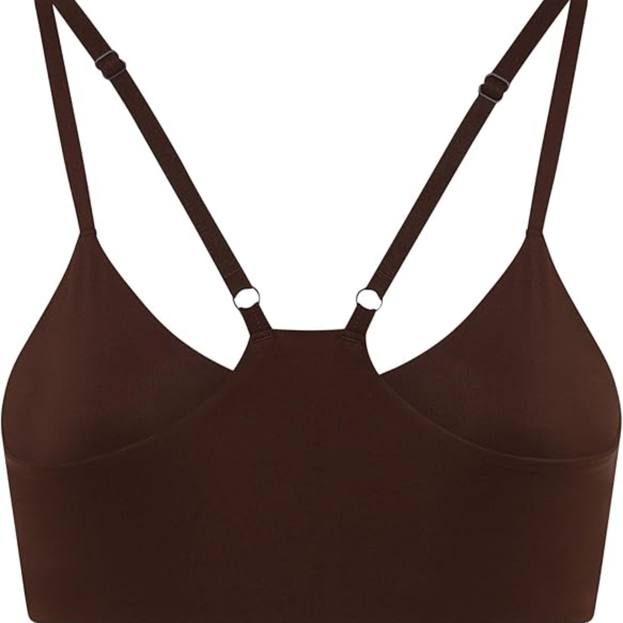 Ein brauner, nahtloser Bralette mit verstellbaren Trägern und ohne sichtbare Verschlüsse oder Verzierungen auf weißem Hintergrund.