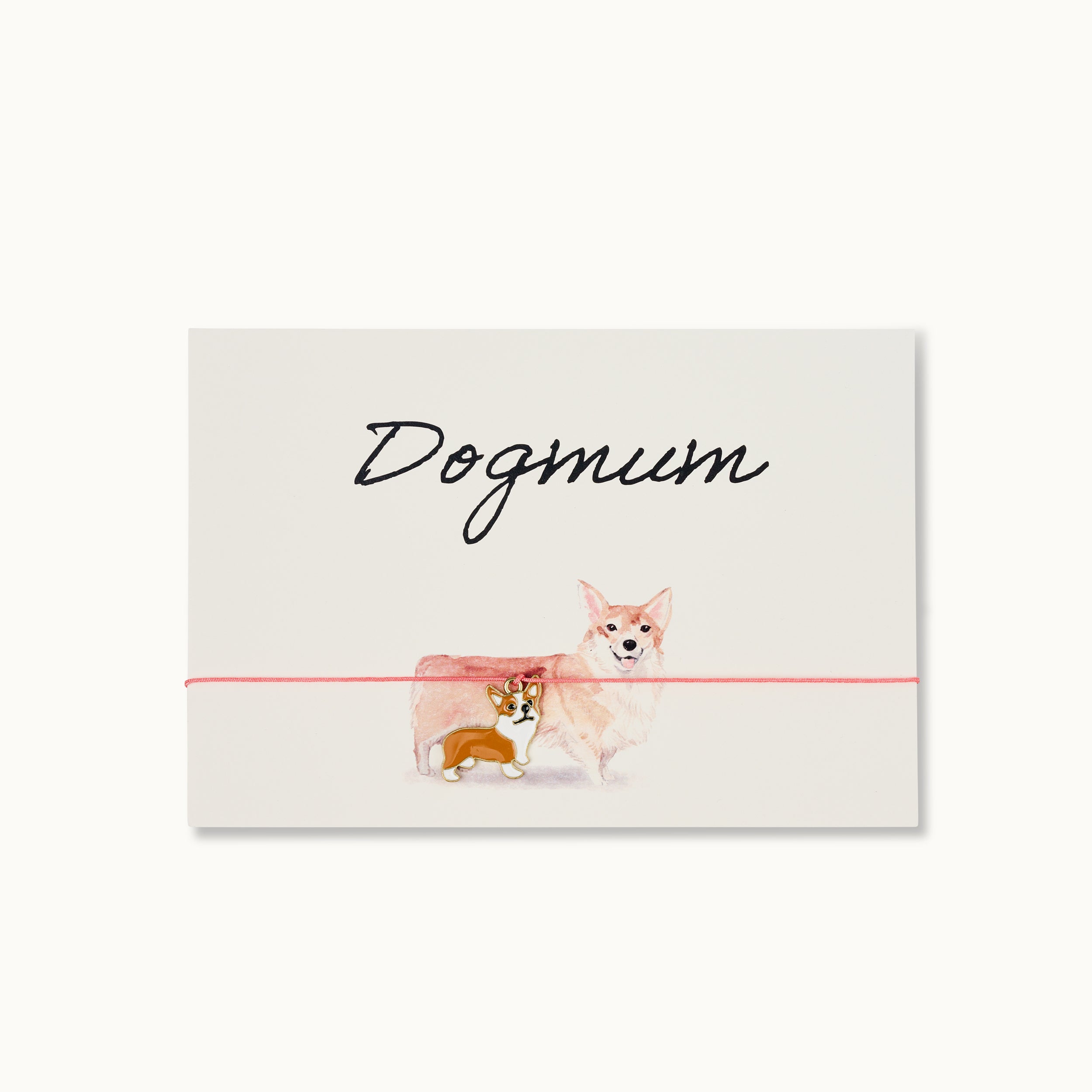 Eine Karte mit dem Wort Dogmum in Kursivschrift oben und einer Illustration von zwei lächelnden Corgis, einem großen und einem kleinen, die nebeneinander stehen. Eine dünne rosa Linie verläuft horizontal über die Karte.