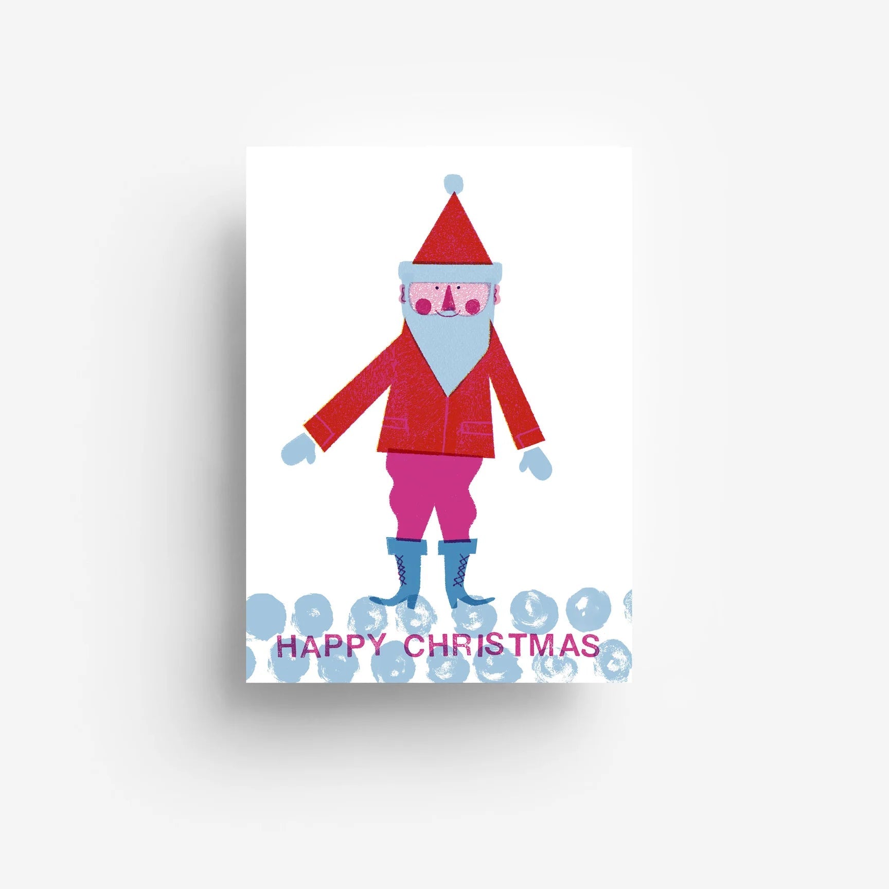 Eine minimalistische Weihnachtskarte zeigt einen stilisierten Weihnachtsmann in Rot-, Rosa- und Blautönen, der auf blauem Schnee steht. Darunter steht in fetten rosa und blauen Buchstaben HAPPY CHRISTMAS.