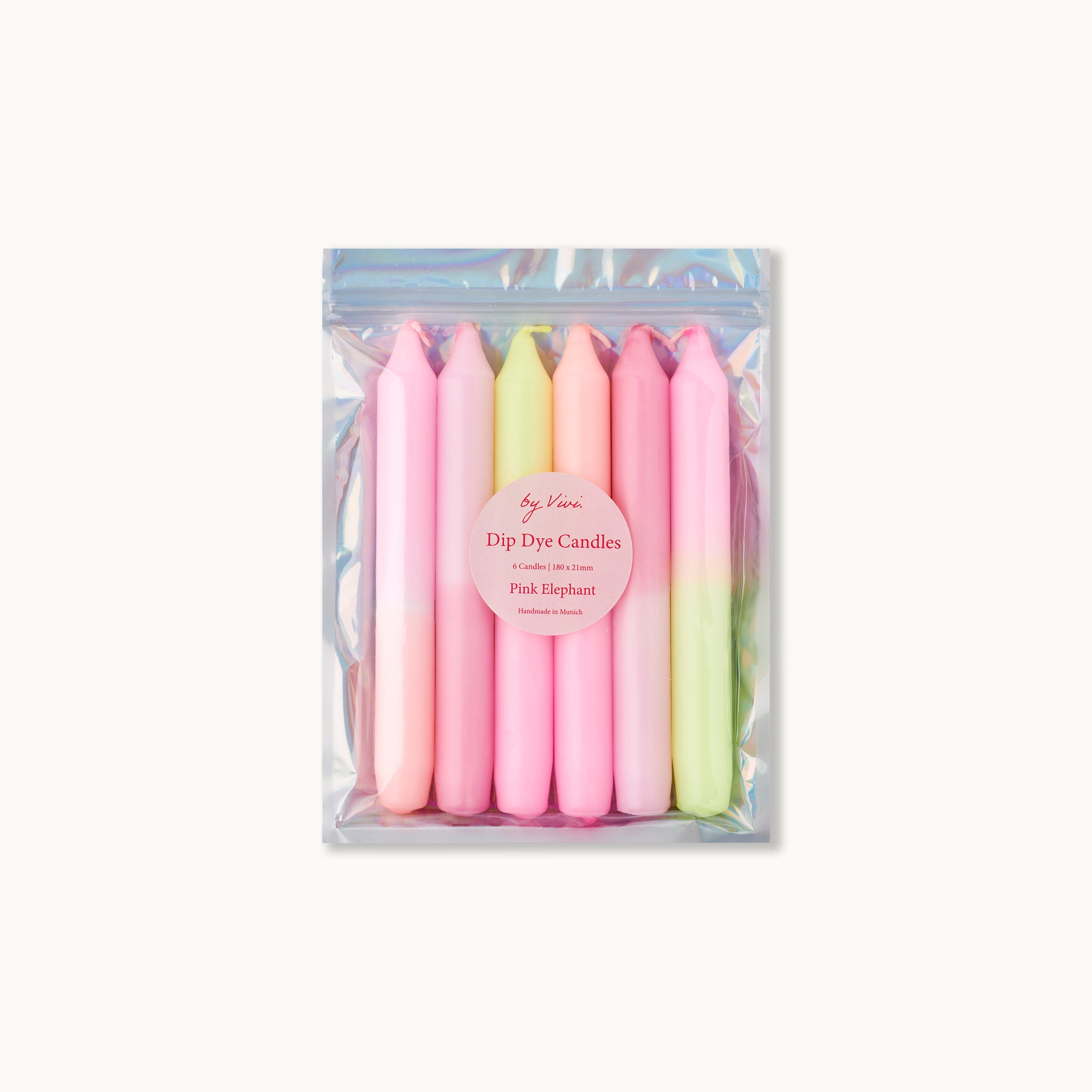 Eine Packung pastellfarbener Dip-Dye-Kerzen in verschiedenen Farben in durchsichtiger Verpackung.