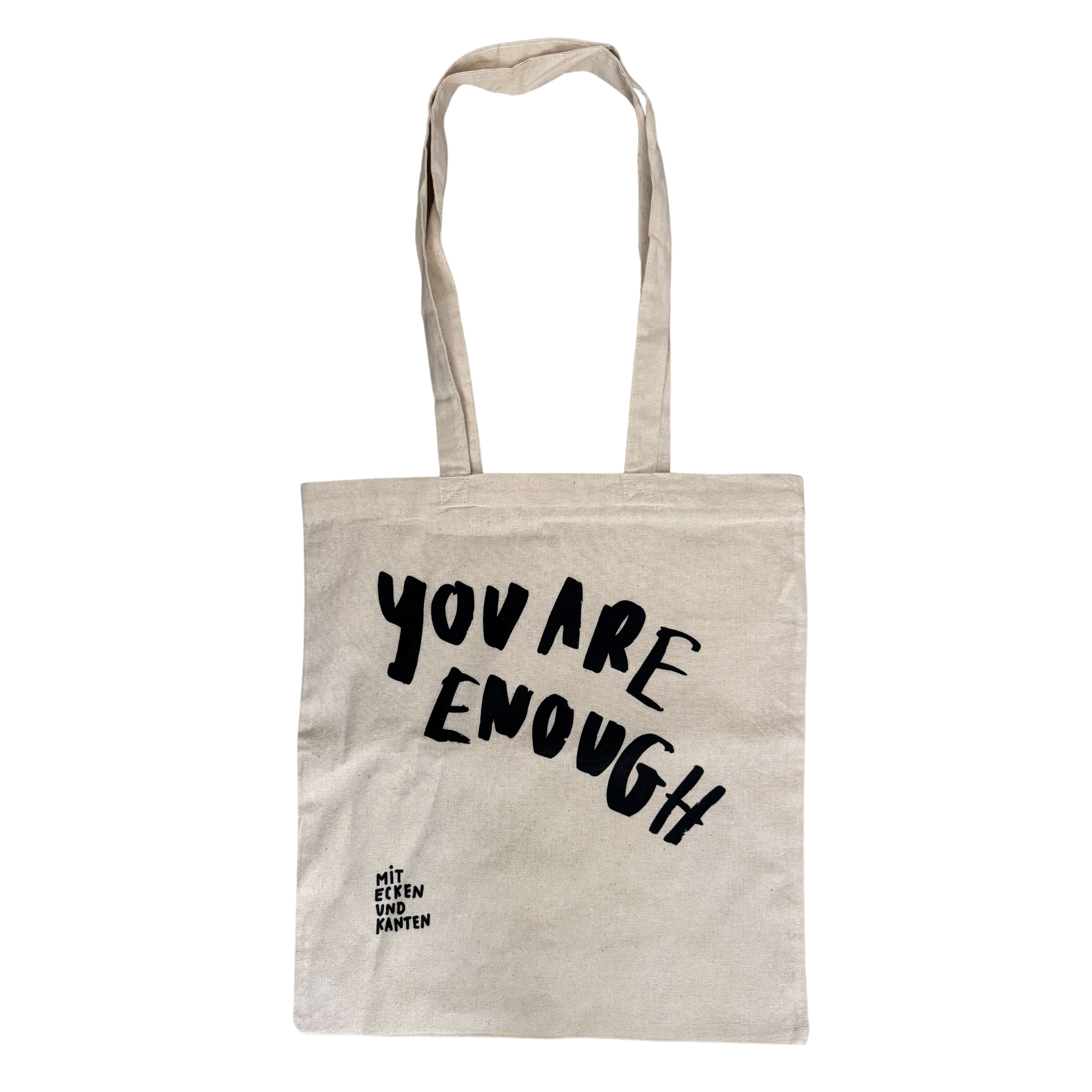 Beige Stofftasche mit schwarzem Text "You are enough" und "Mit Ecken und Kanten".